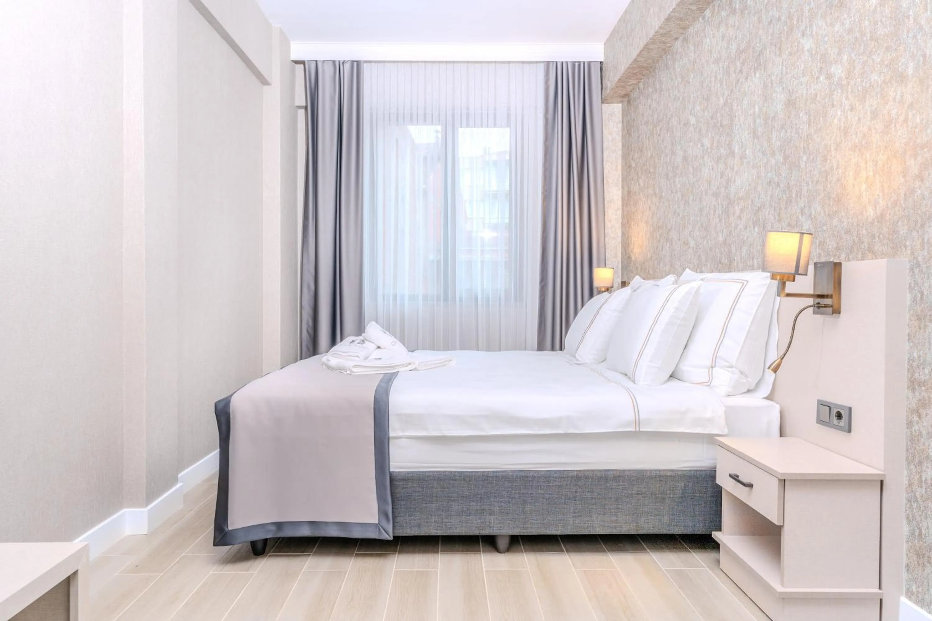 Bed in Olea Suites Otel