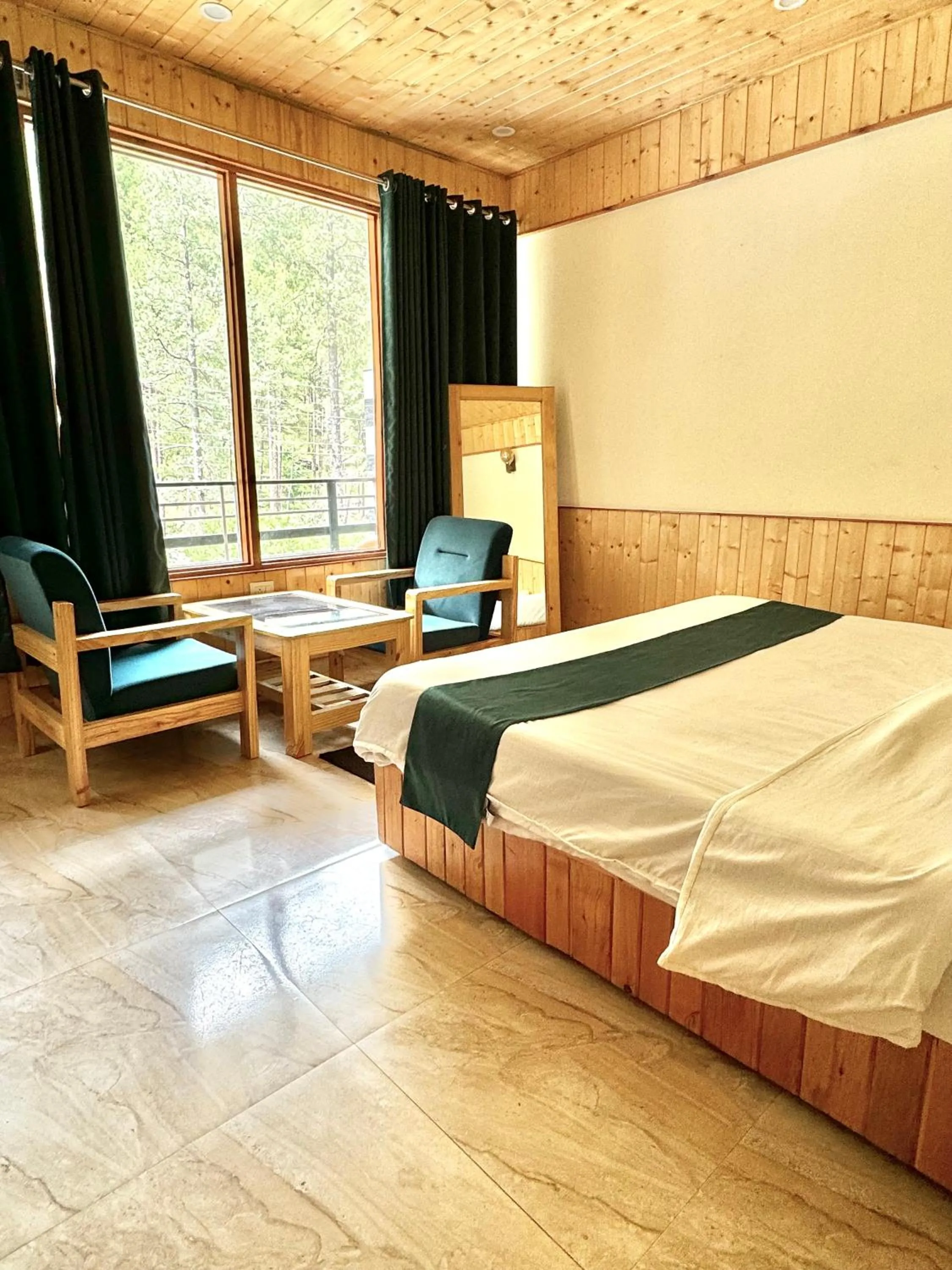 Photo of the whole room, Bed in Hotel Mid Orchard Kasol -River Side