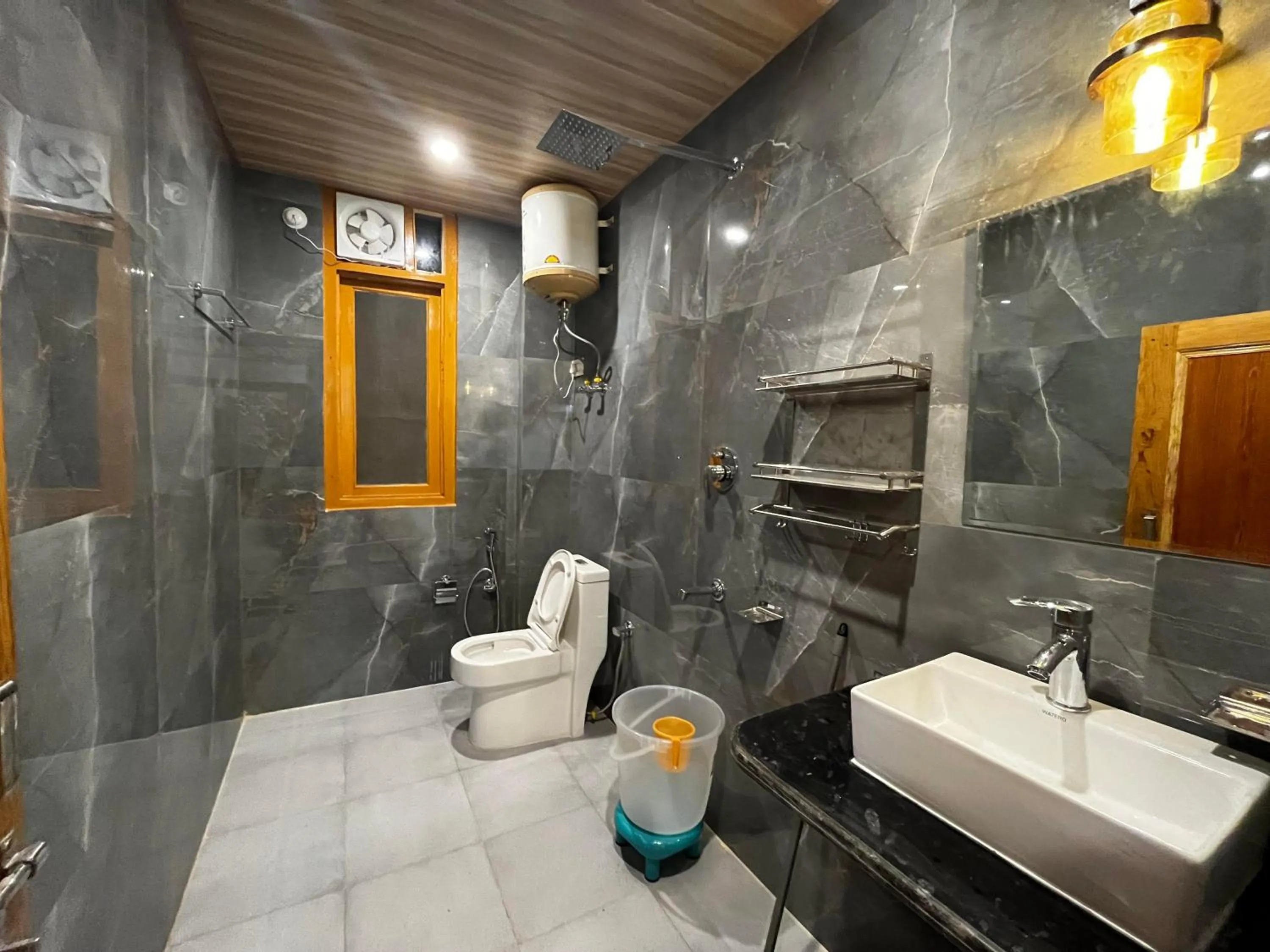 Shower in Hotel Mid Orchard Kasol -River Side