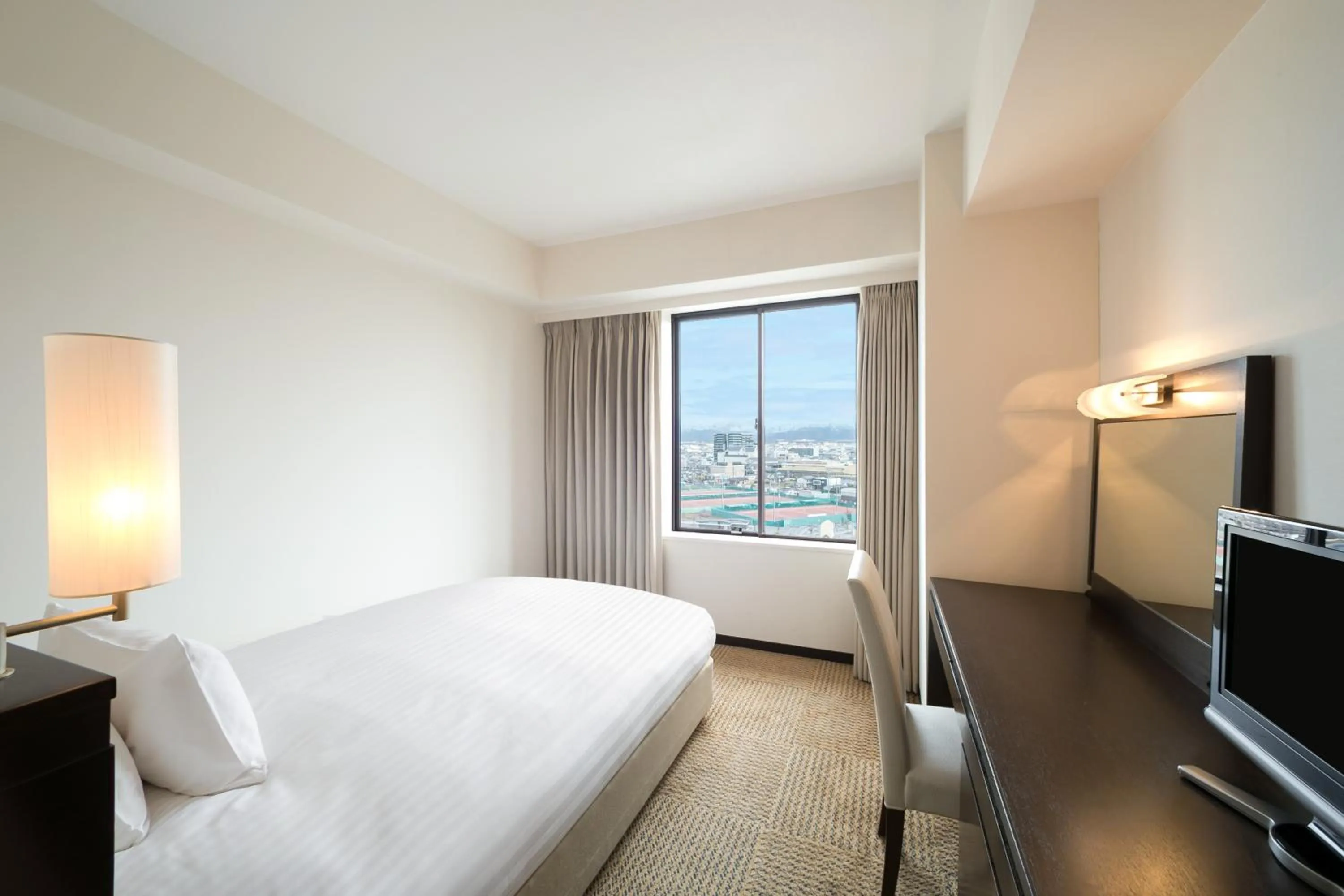 Bed in Grand Mercure Lake Biwa Resort & Spa