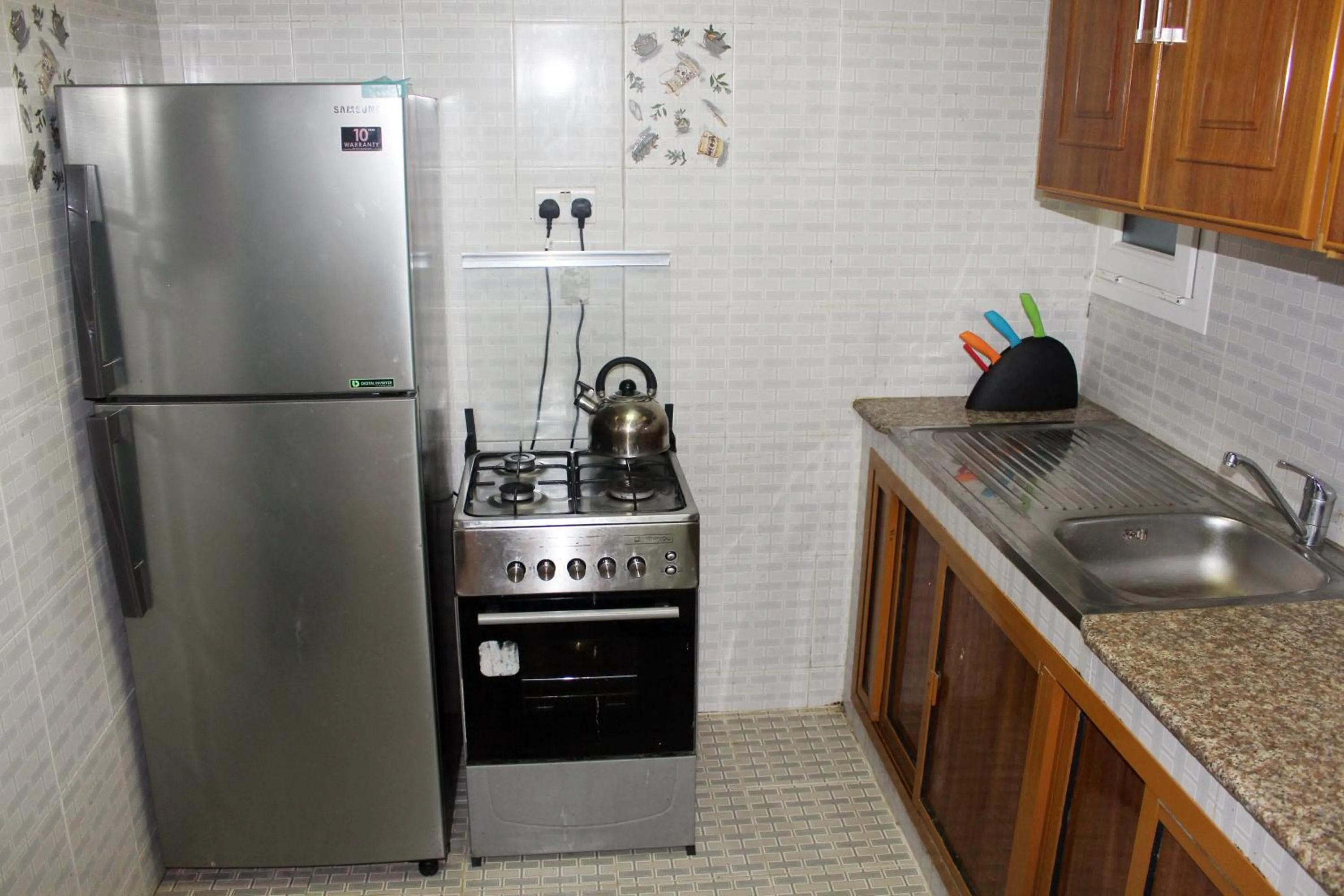 Kitchen or kitchenette in Al Noor Furnished Flats