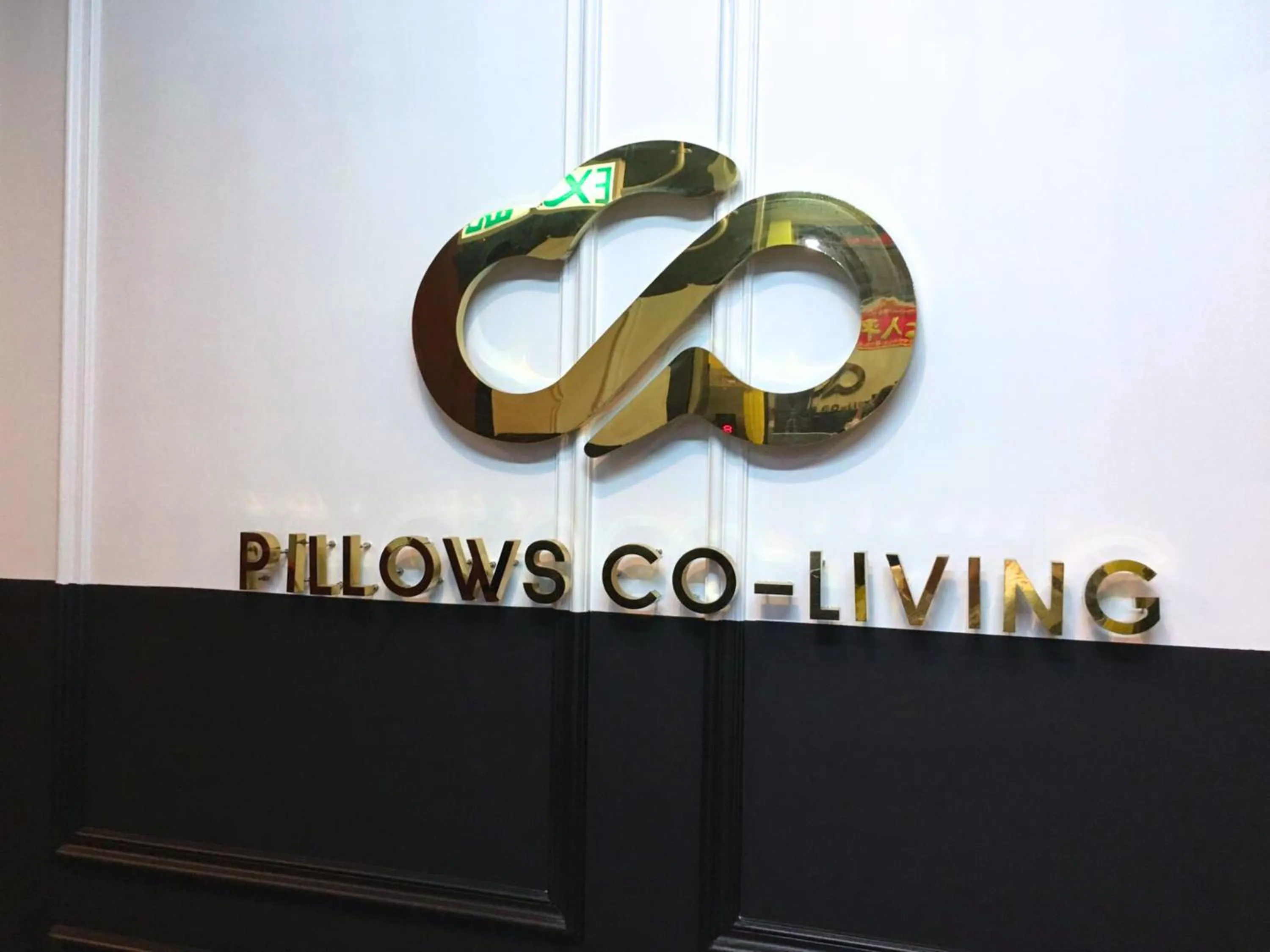 Property logo or sign in Pillows CoLiving