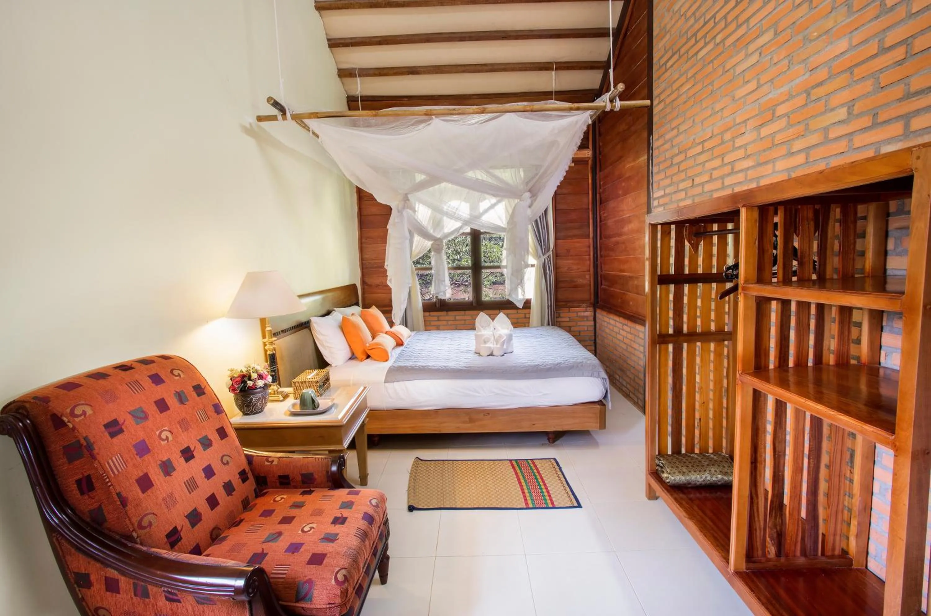 Photo of the whole room, Bed in Cat Tien Jungle Lodge