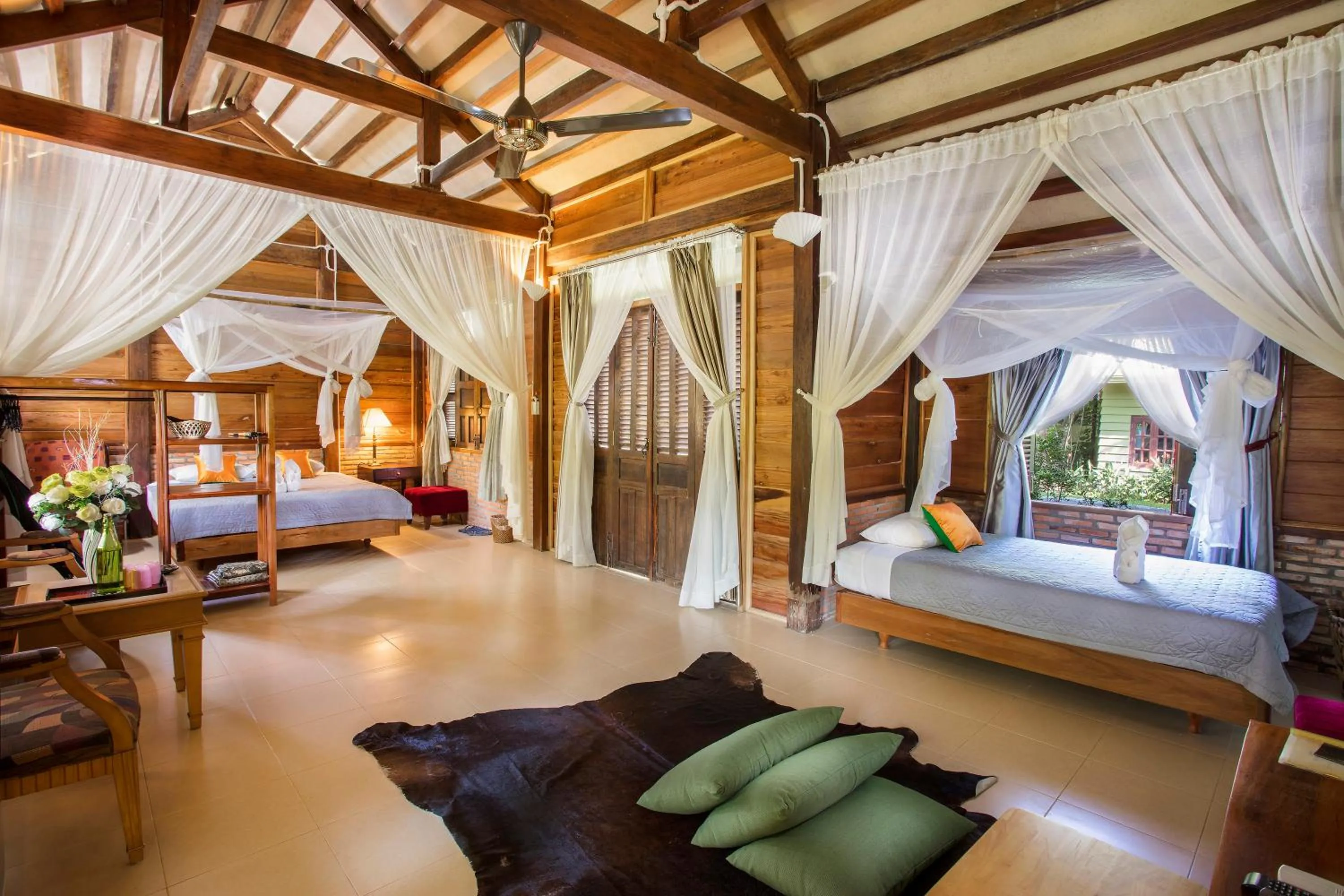 Photo of the whole room, Bed in Cat Tien Jungle Lodge