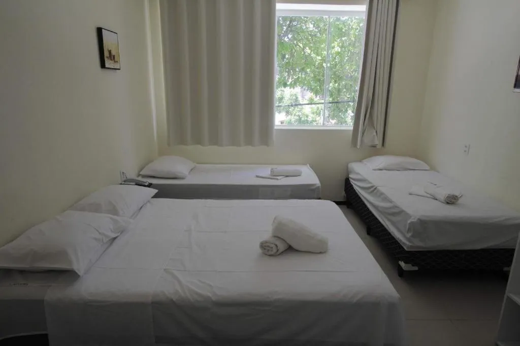 Bed in Alfinin Hotel de Praia