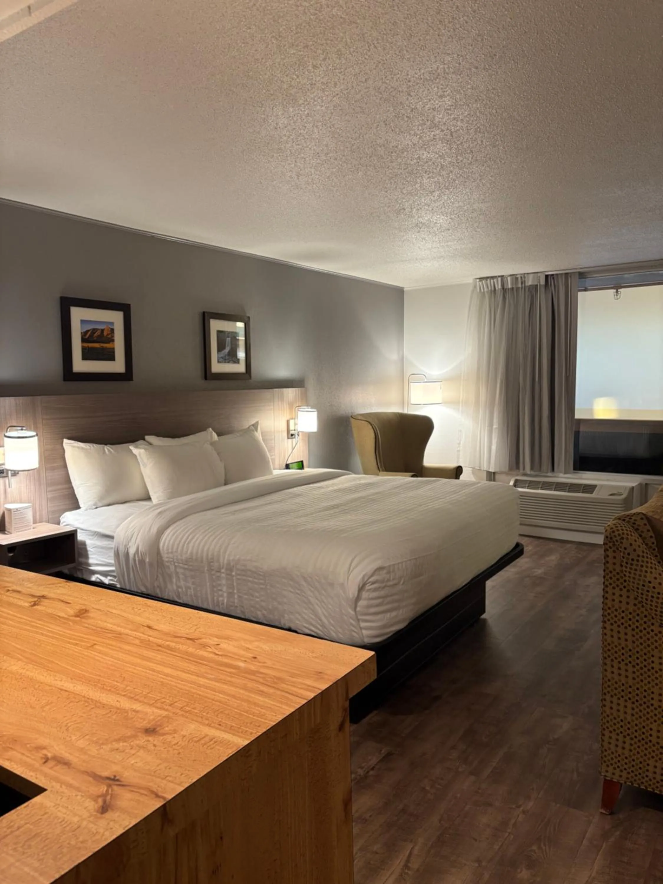 Bed in Clarion Inn & Suites and Convention Center
