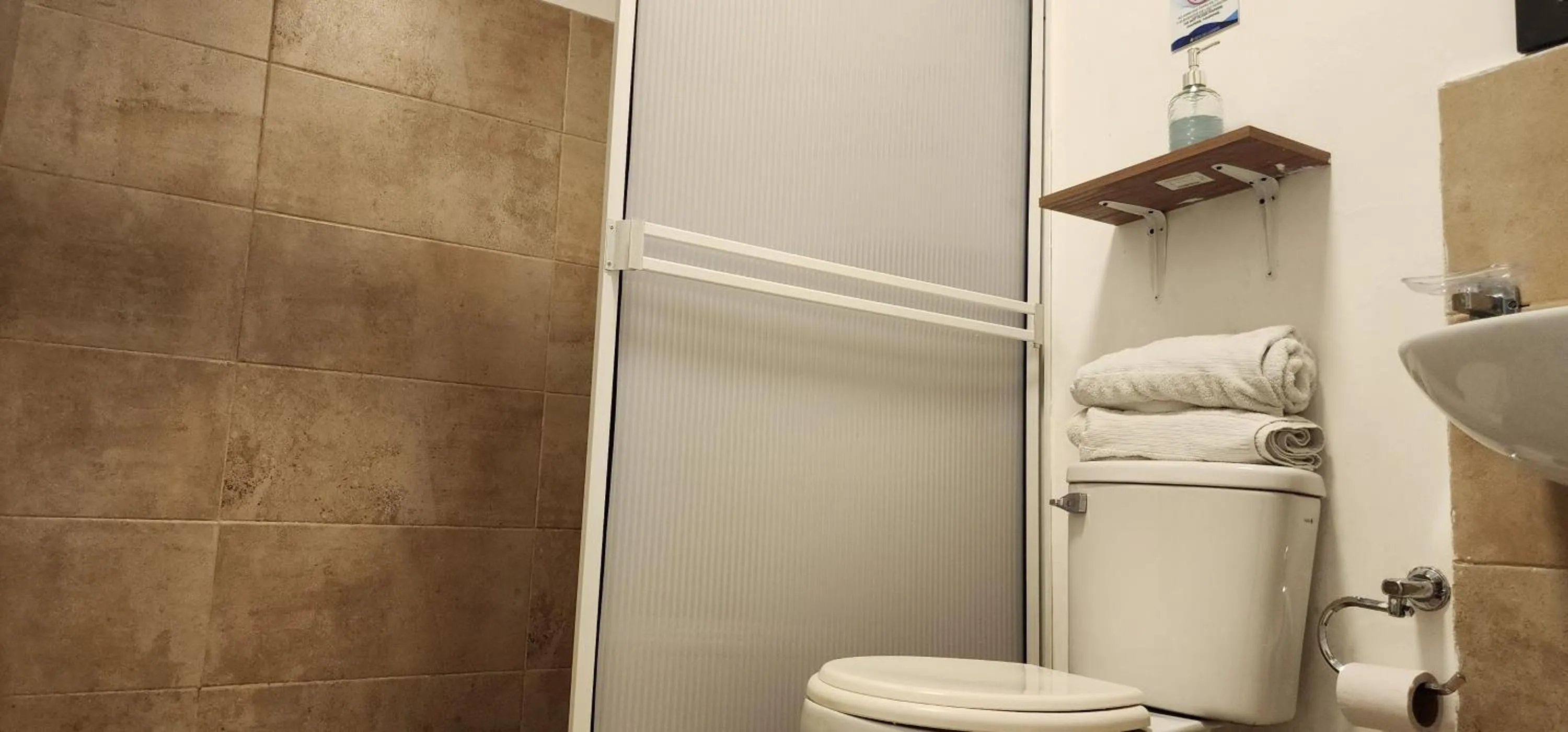 Shower in Edificio Regata INN