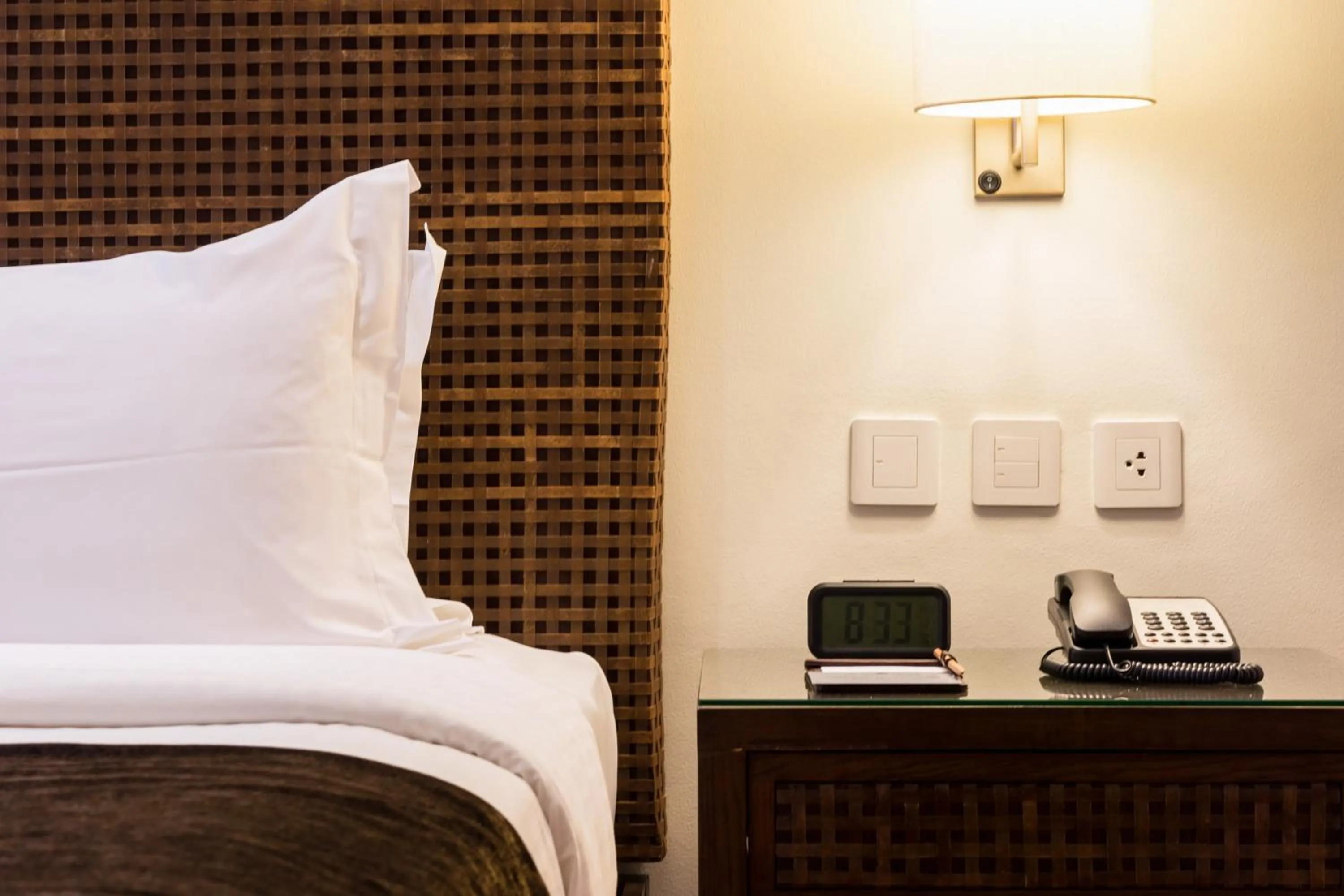 Bed in City Garden Grand Hotel