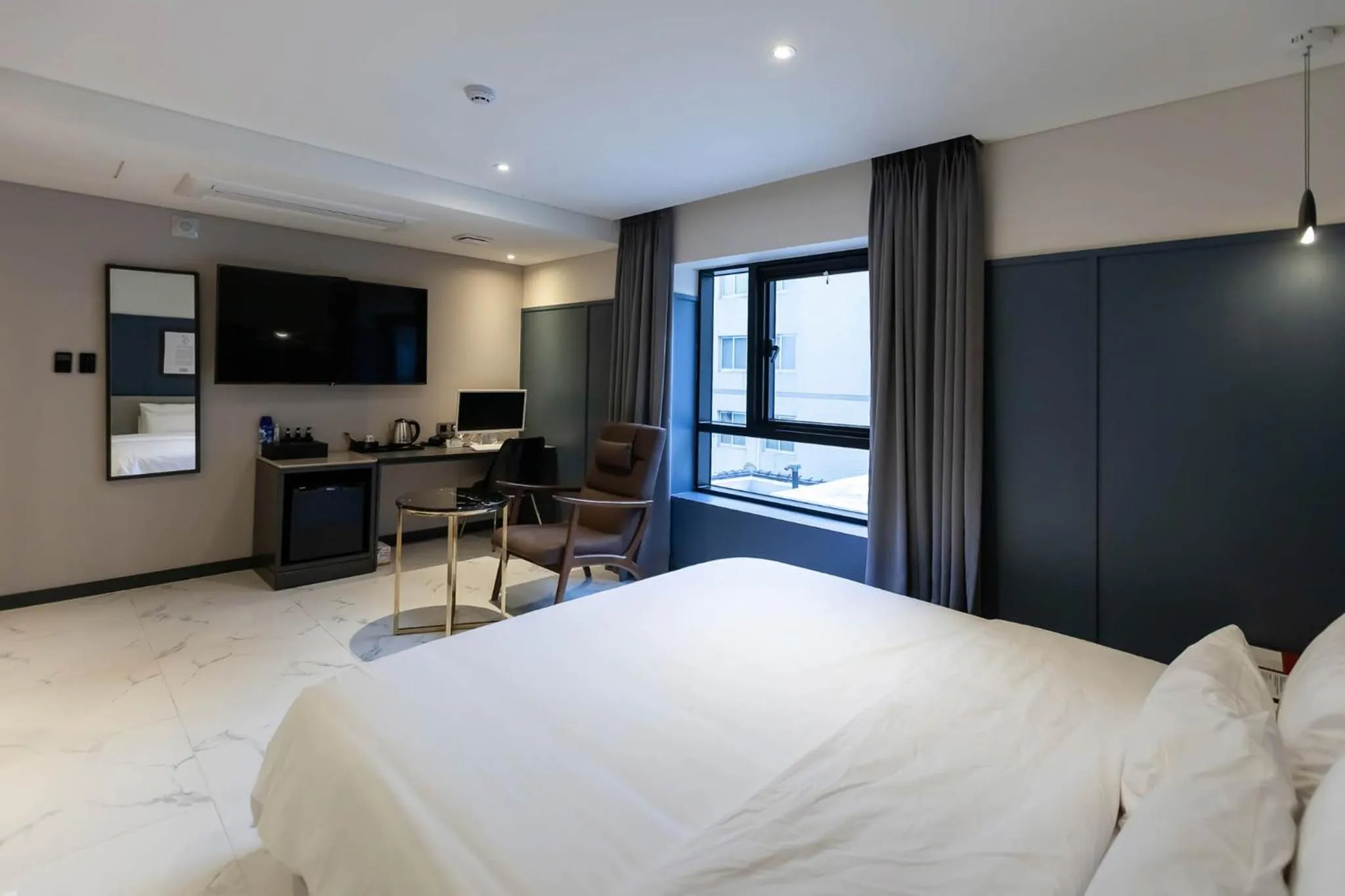 Bed in Brown Dot Hotel Hadan