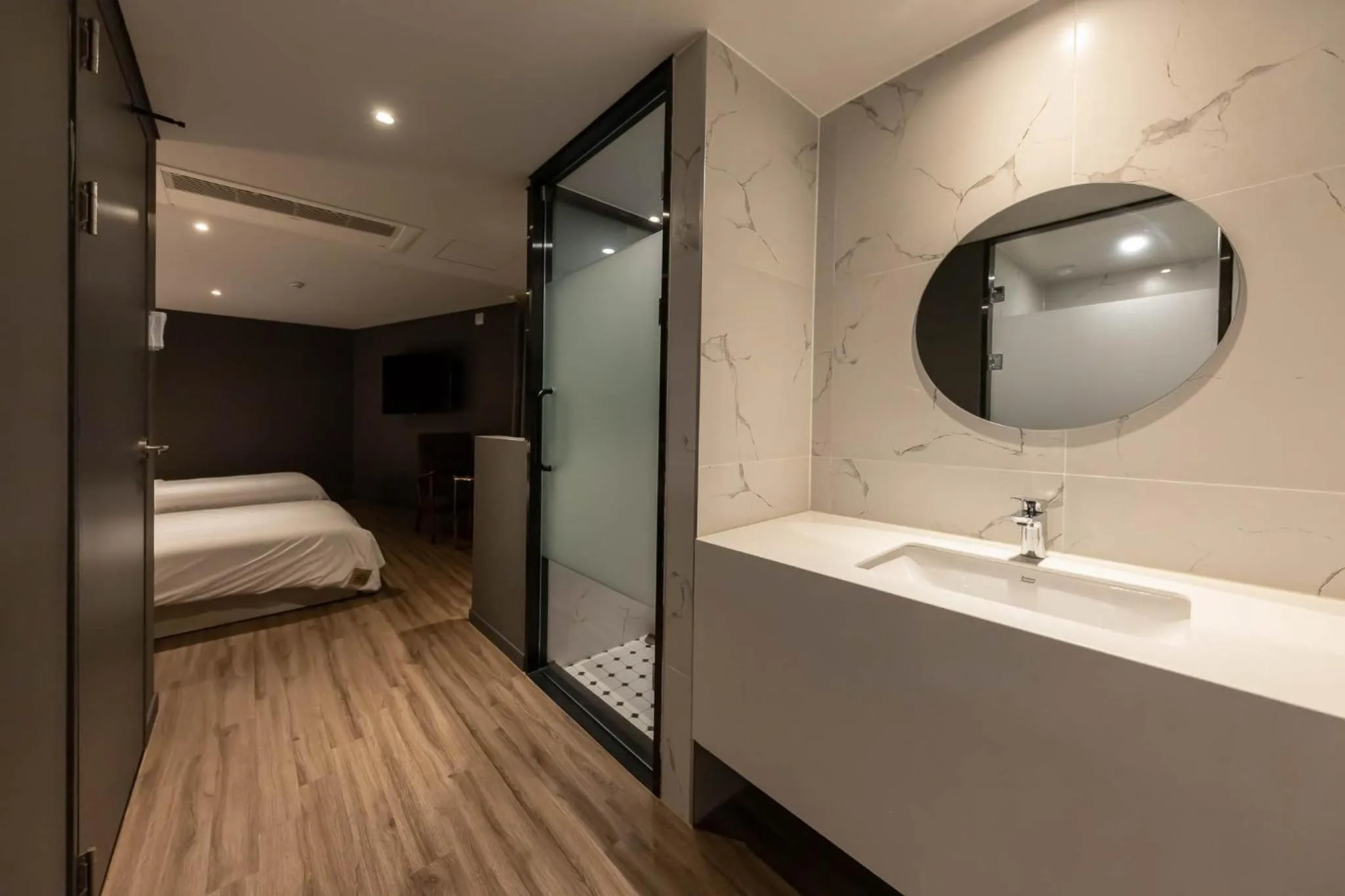 Bed in Brown Dot Hotel Hadan