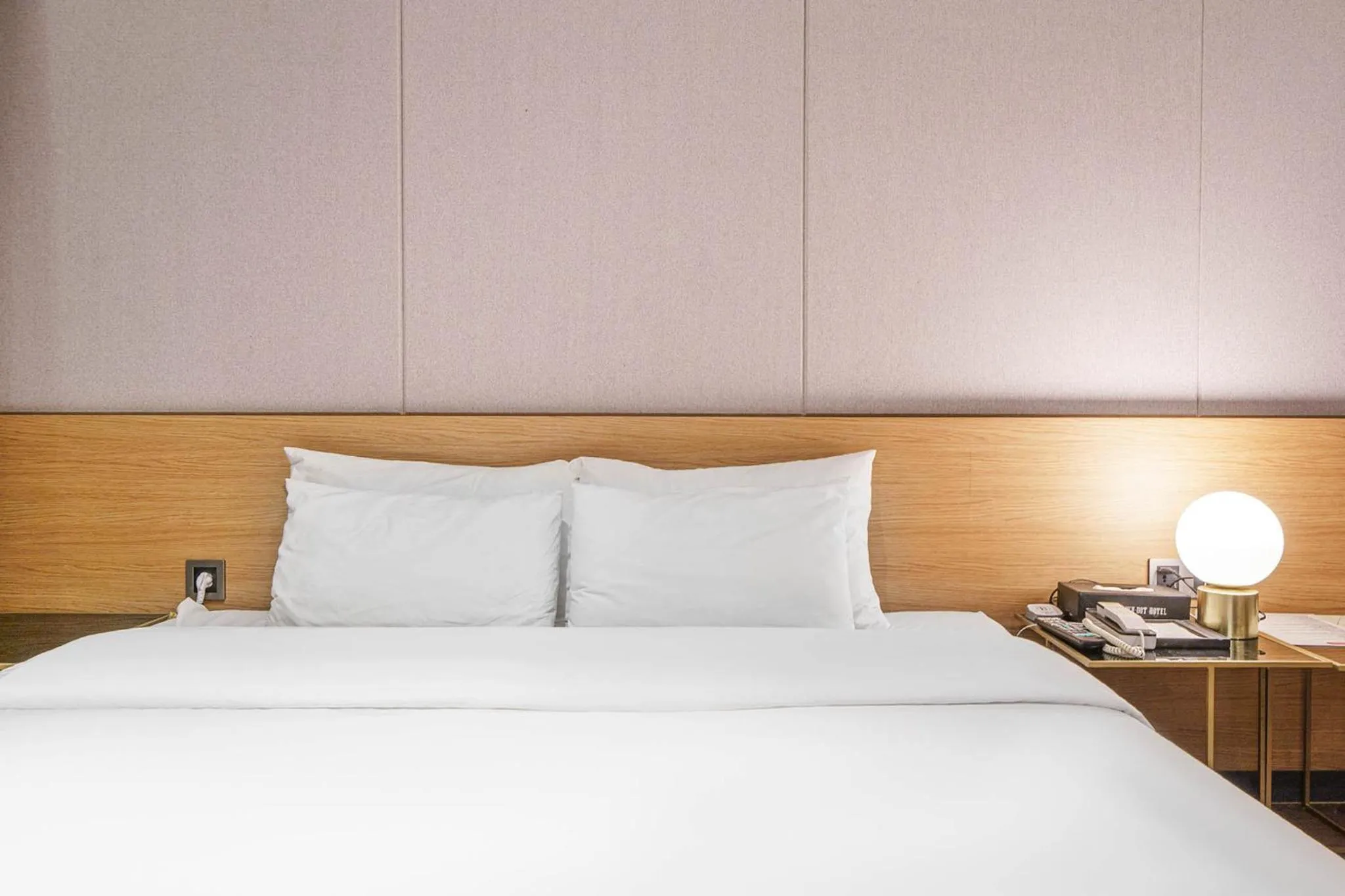 Bed in Brown Dot Hotel Hadan