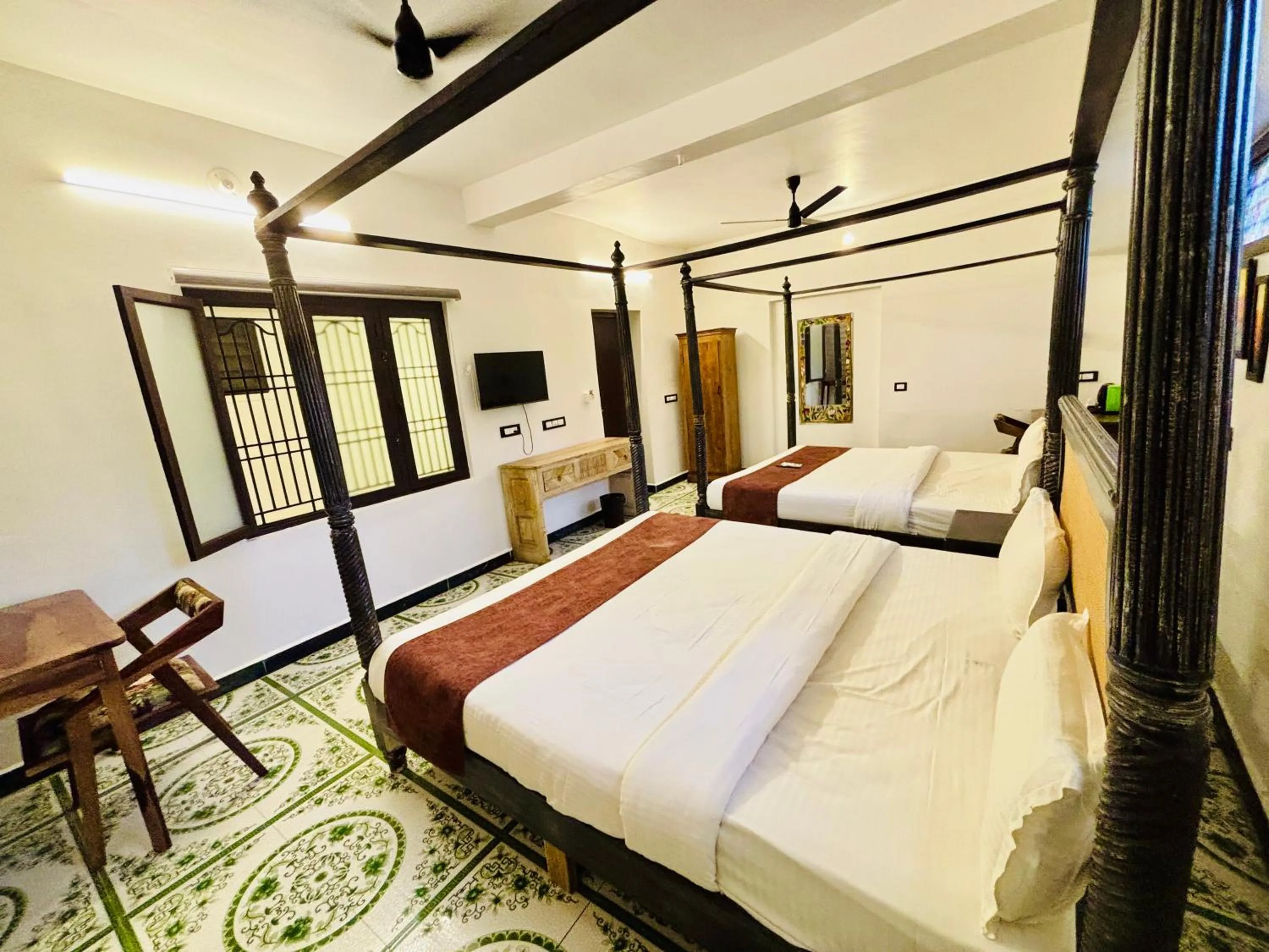 Bed in Courtyard Castle Heritage Resort