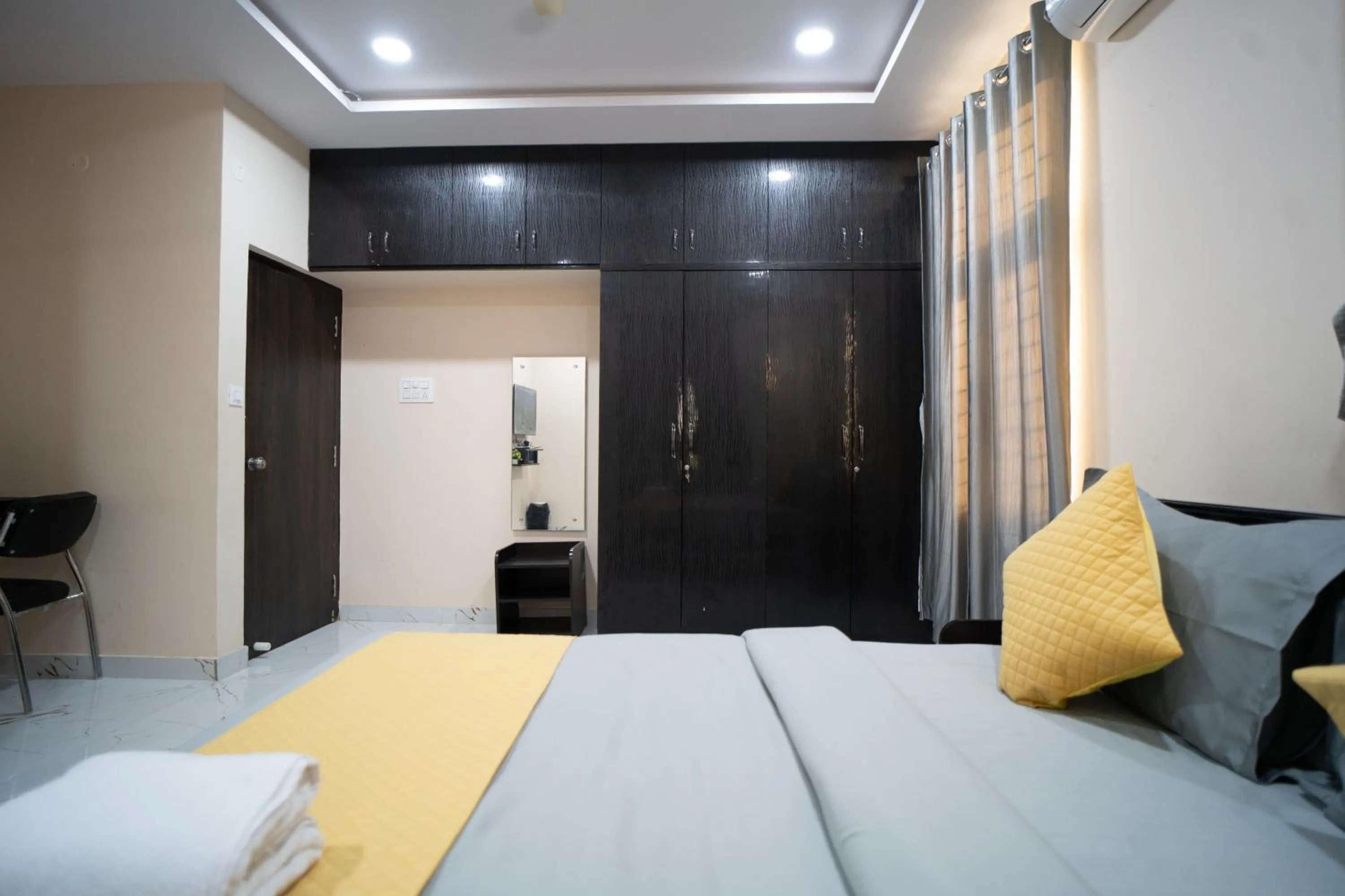 Bed in Yellow Bells Gachibowli