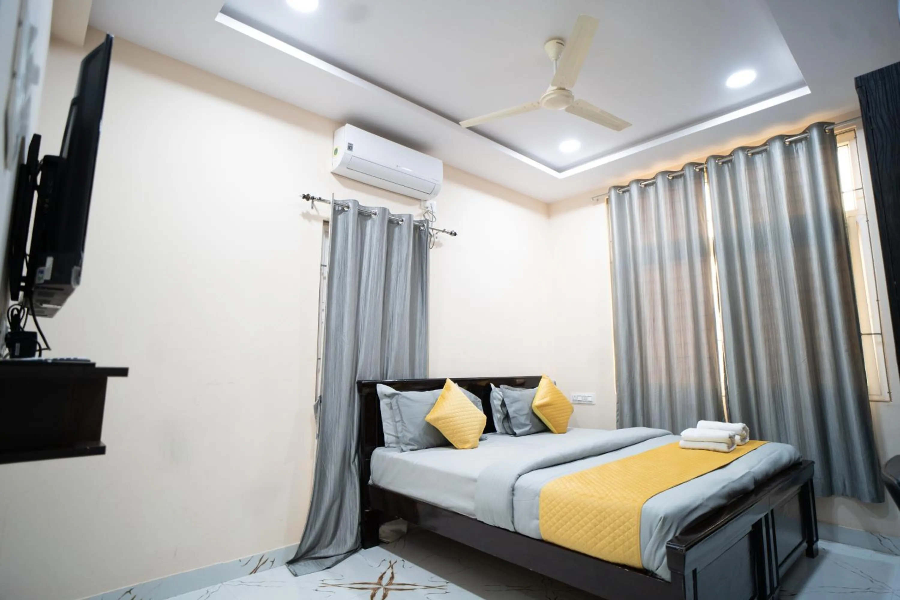 Bed in Yellow Bells Gachibowli