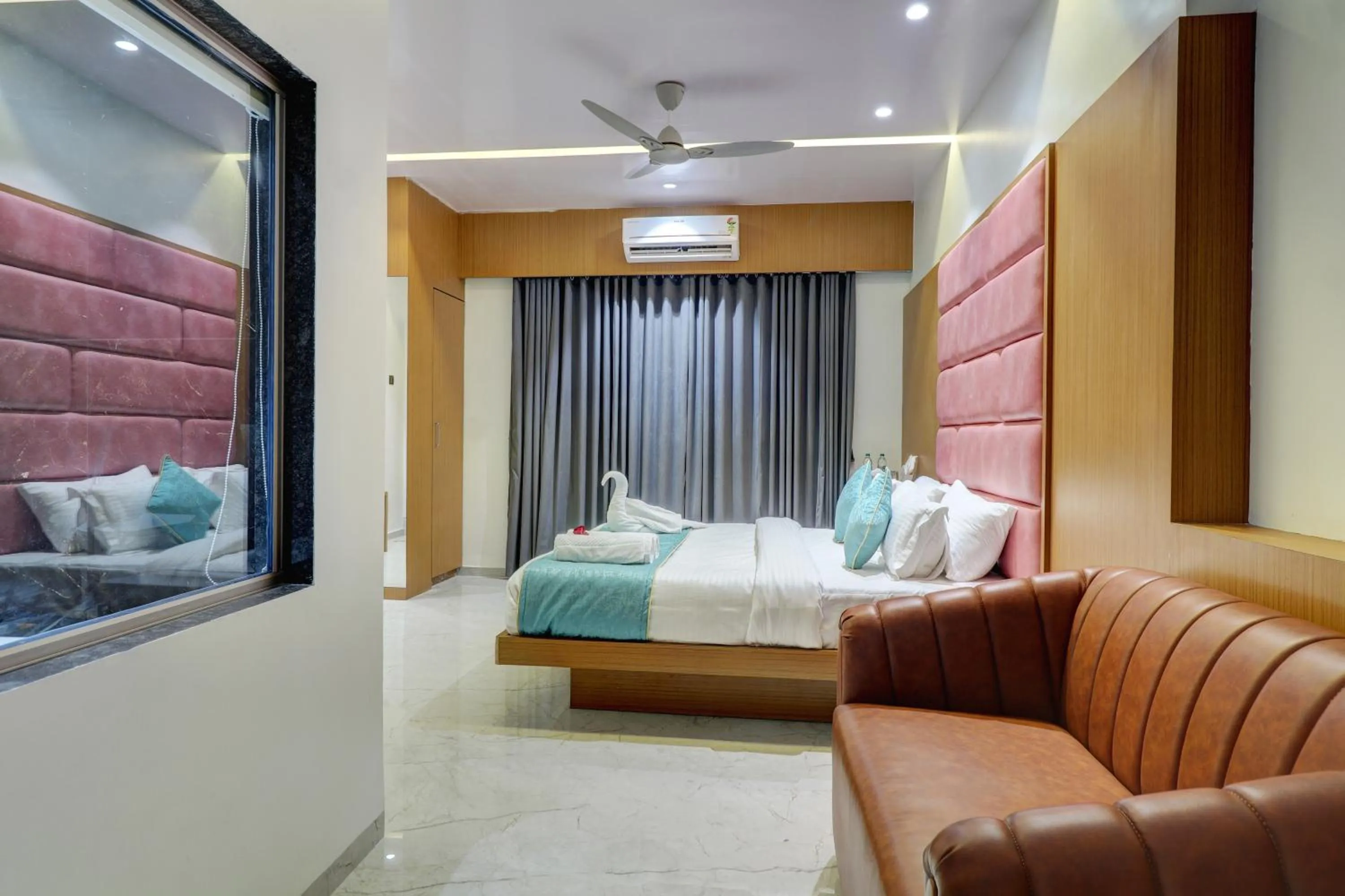 Living room, Bed in Radhe Residency