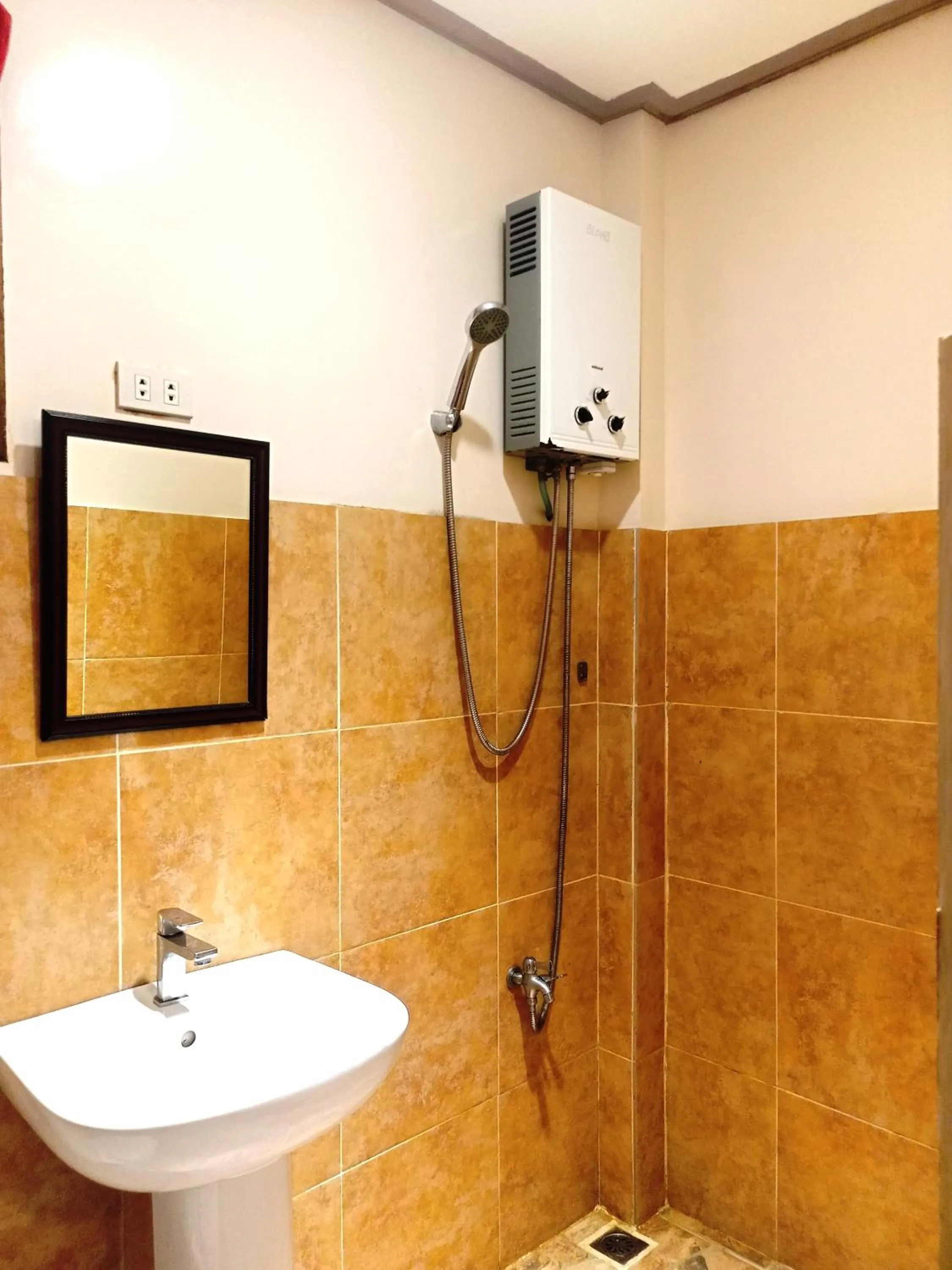 Shower in Ausan Beach Front Cottages