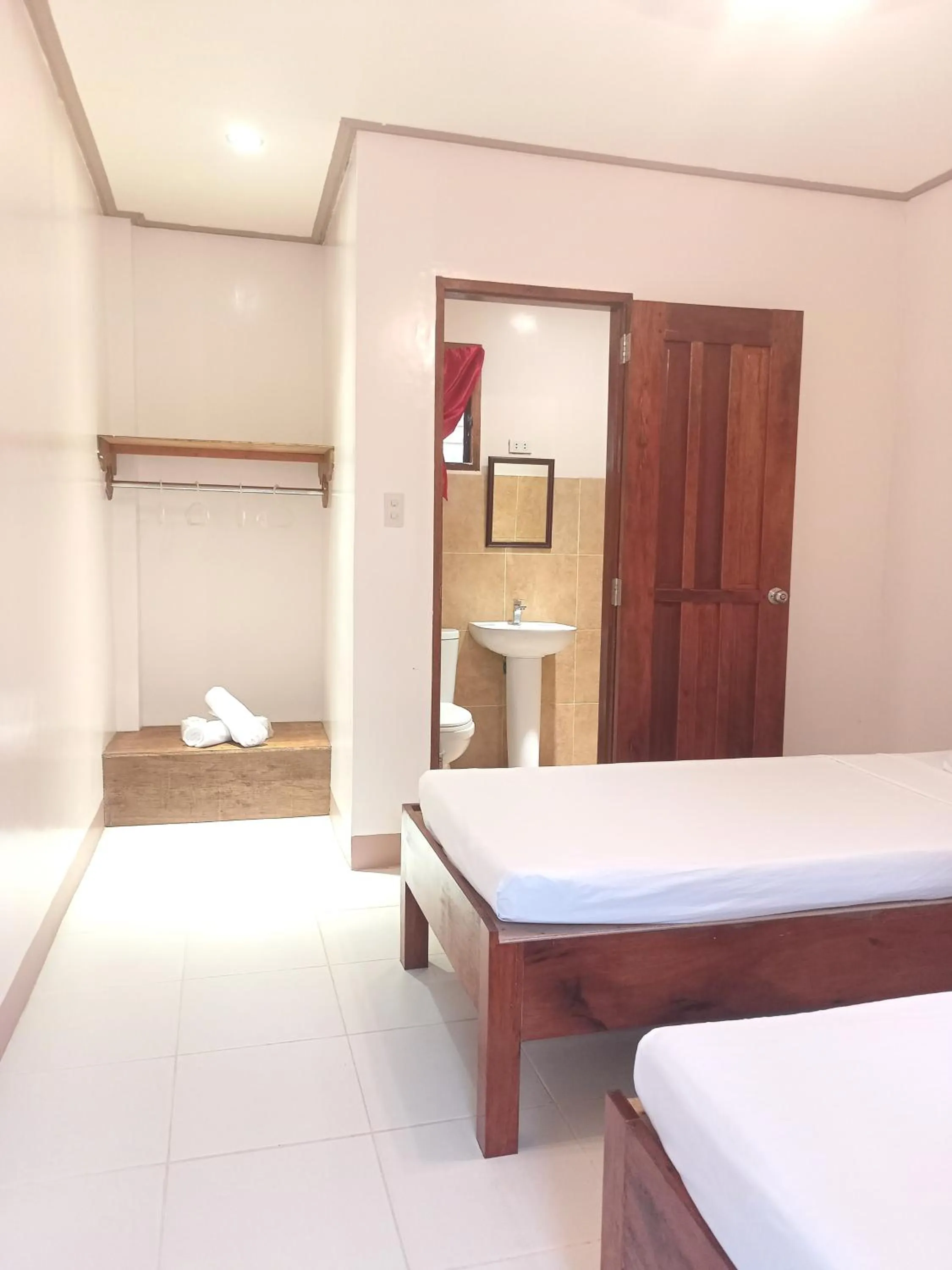 Toilet, Bed in Ausan Beach Front Cottages