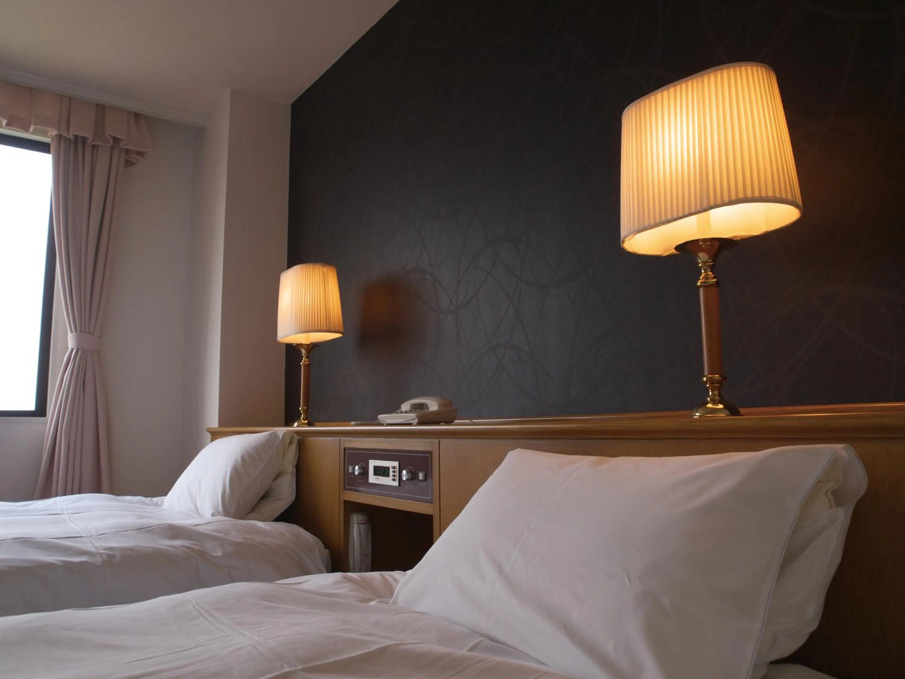 Bed in Grand Mercure Nasu Highlands Resort & Spa