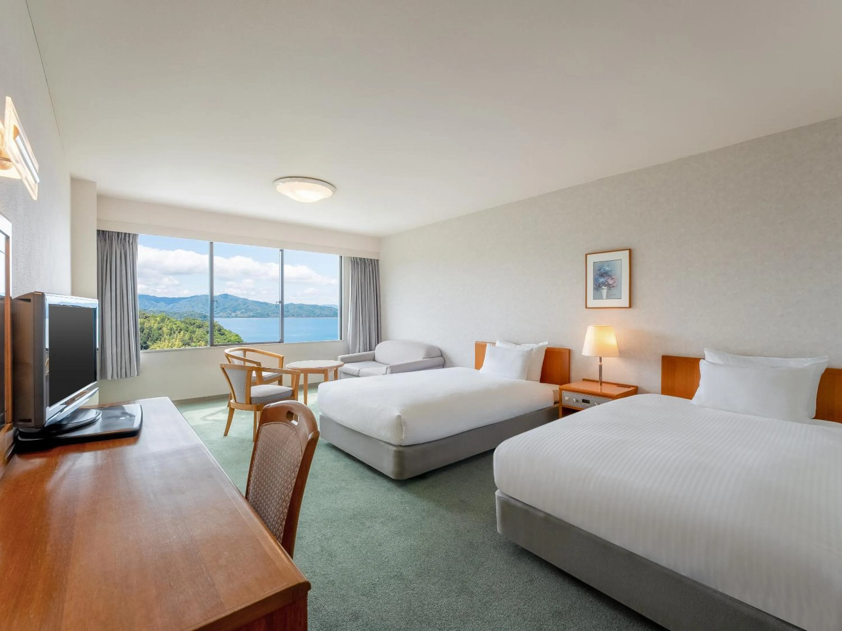 Bed in Mercure Kyoto Miyazu Resort & Spa