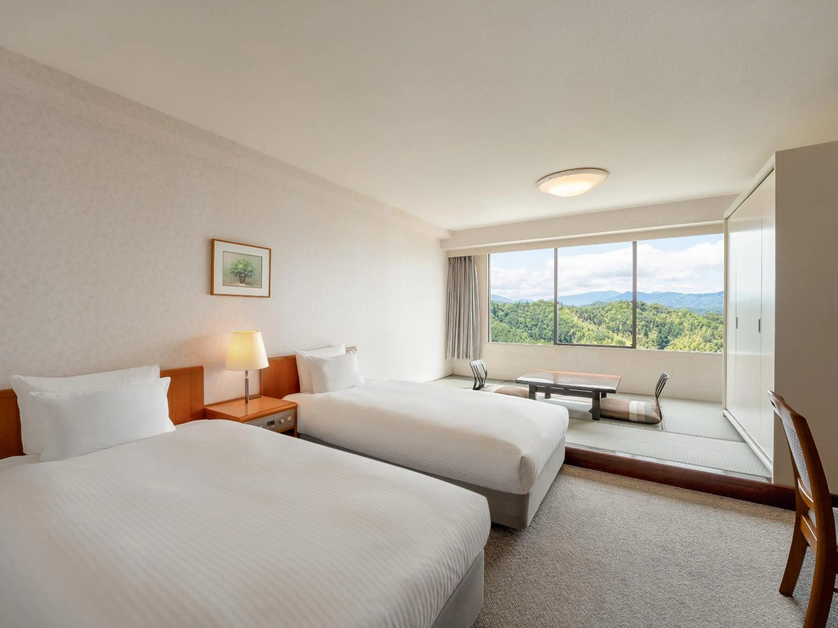 Bed in Mercure Kyoto Miyazu Resort & Spa