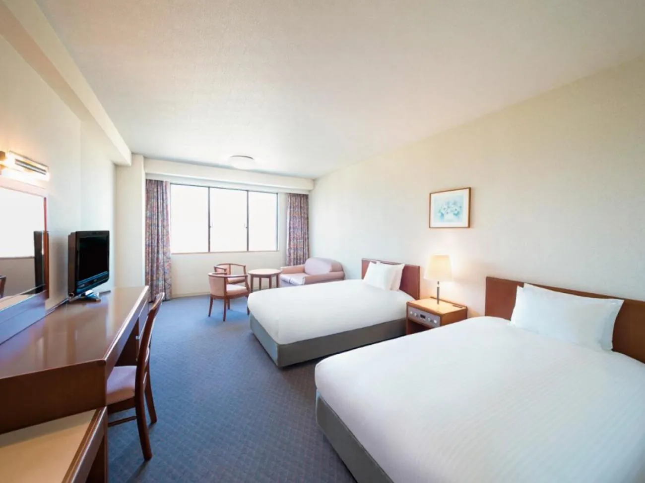 Bed in Grand Mercure Wakayama Minabe Resort & Spa