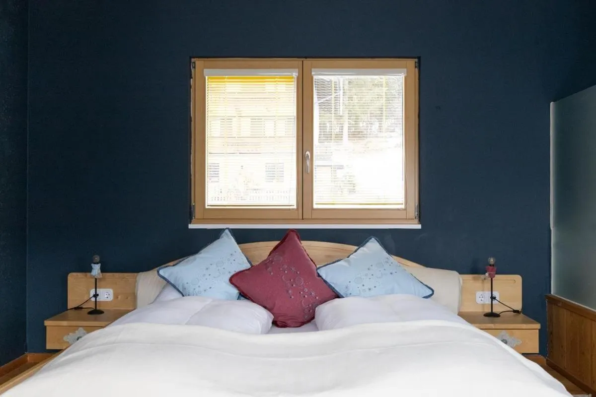 Bed in Appartementhotel am Weissensee