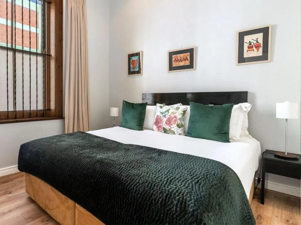 Bed in Long Street Self Catering Apartments