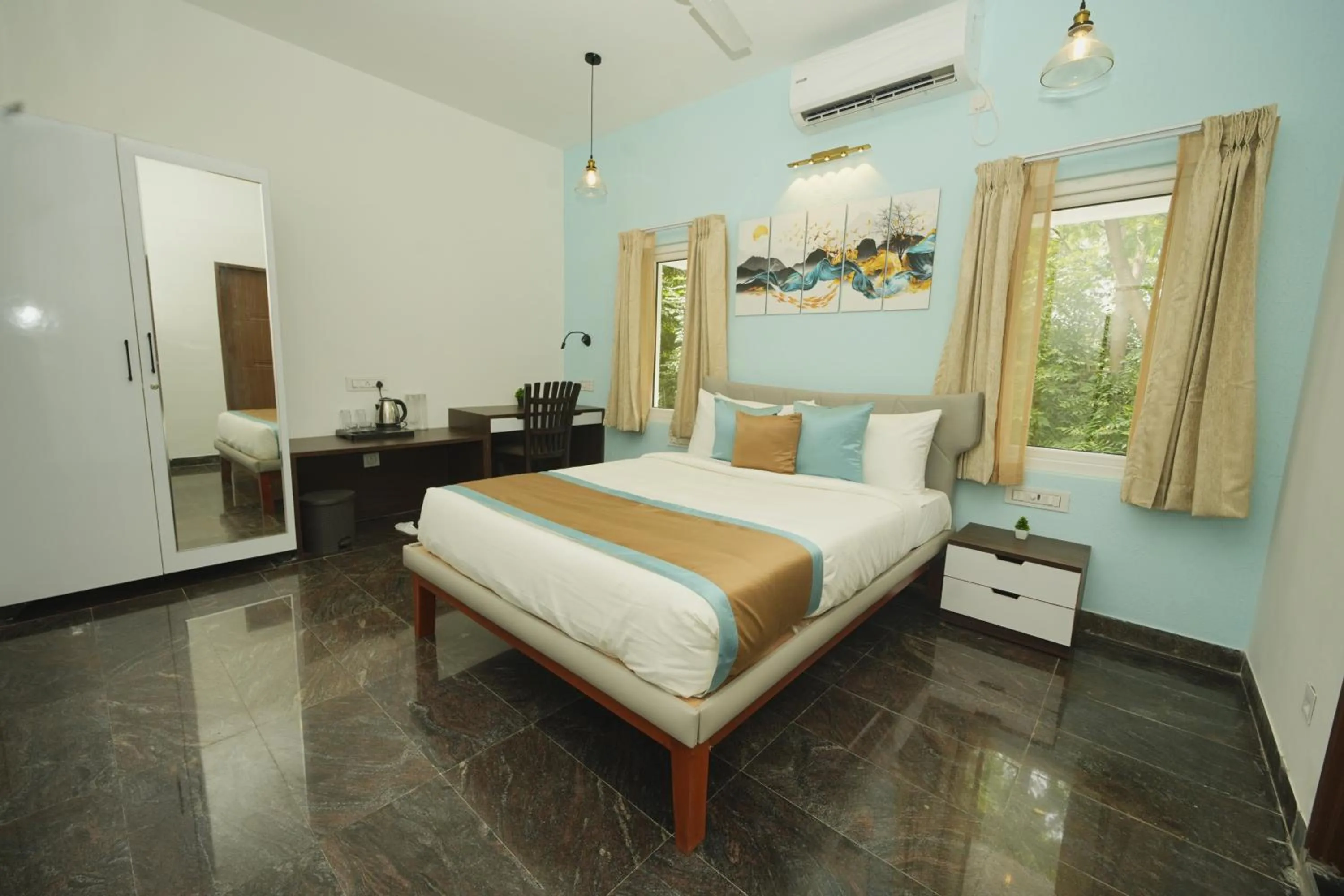 Bed in Bay Breeze Suites