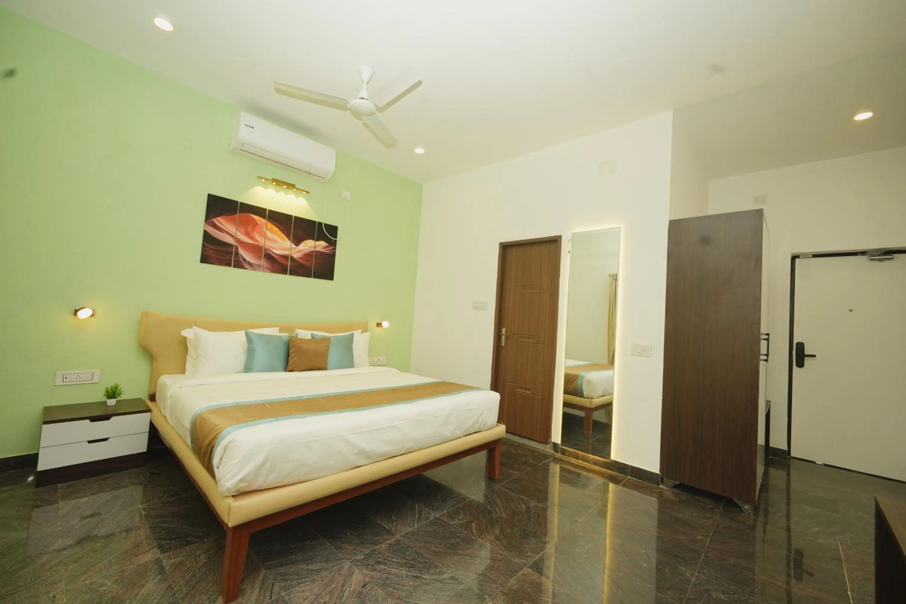 Bed in Bay Breeze Suites