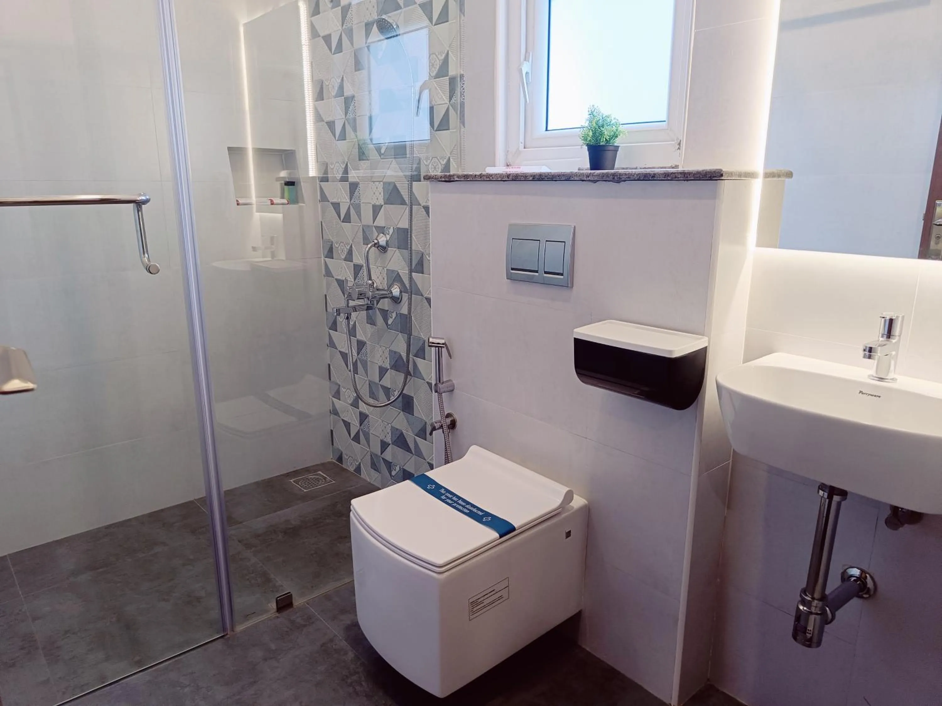 Toilet in Bay Breeze Suites