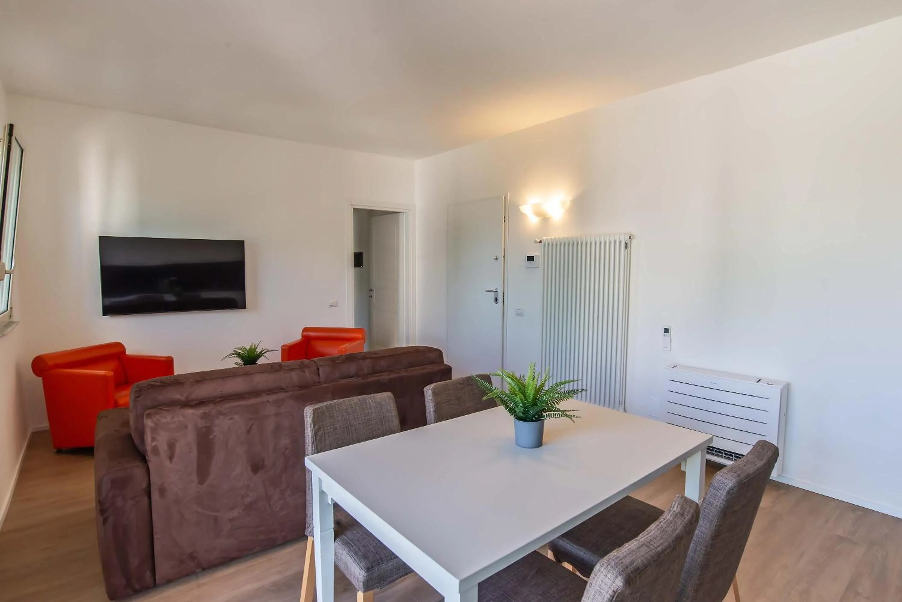 Communal lounge/ TV room in Appartamenti Tre Fontane