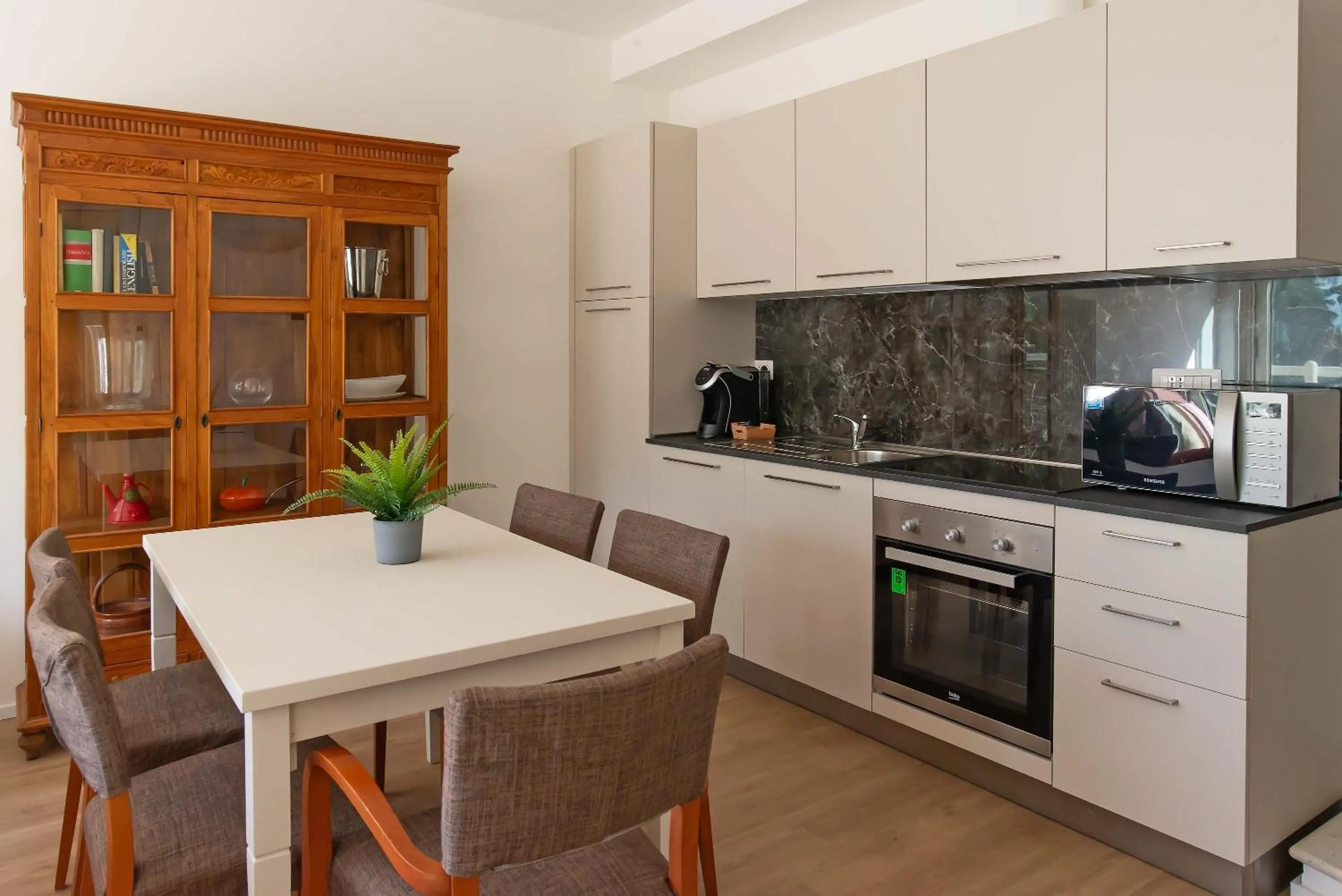 Kitchen or kitchenette in Appartamenti Tre Fontane