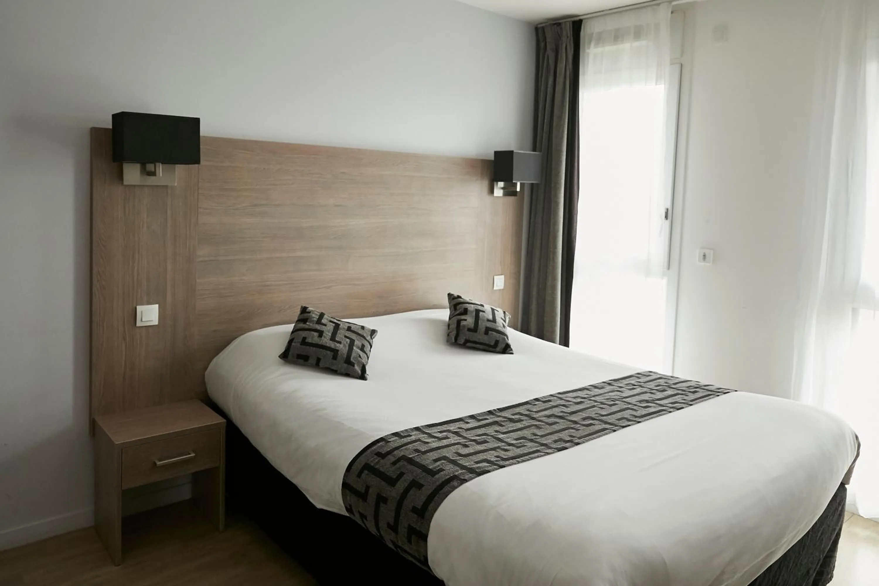 Photo of the whole room, Bed in Tulip Inn Massy Palaiseau - Residence