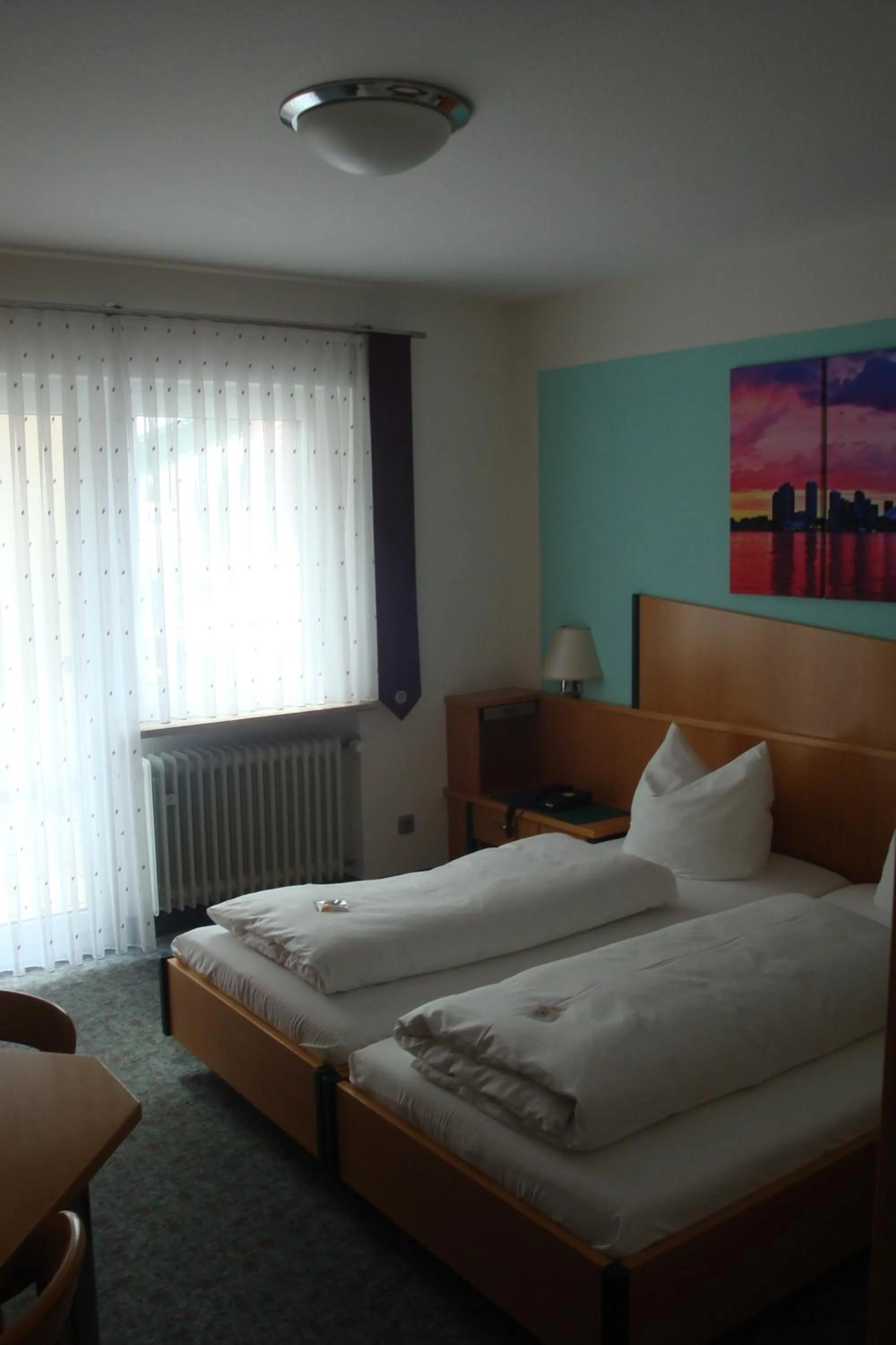 Photo of the whole room, Bed in Hotel Restaurant zur Windmühle