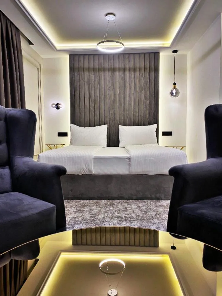 Seating area, Bed in Hotel Boutique Bristol
