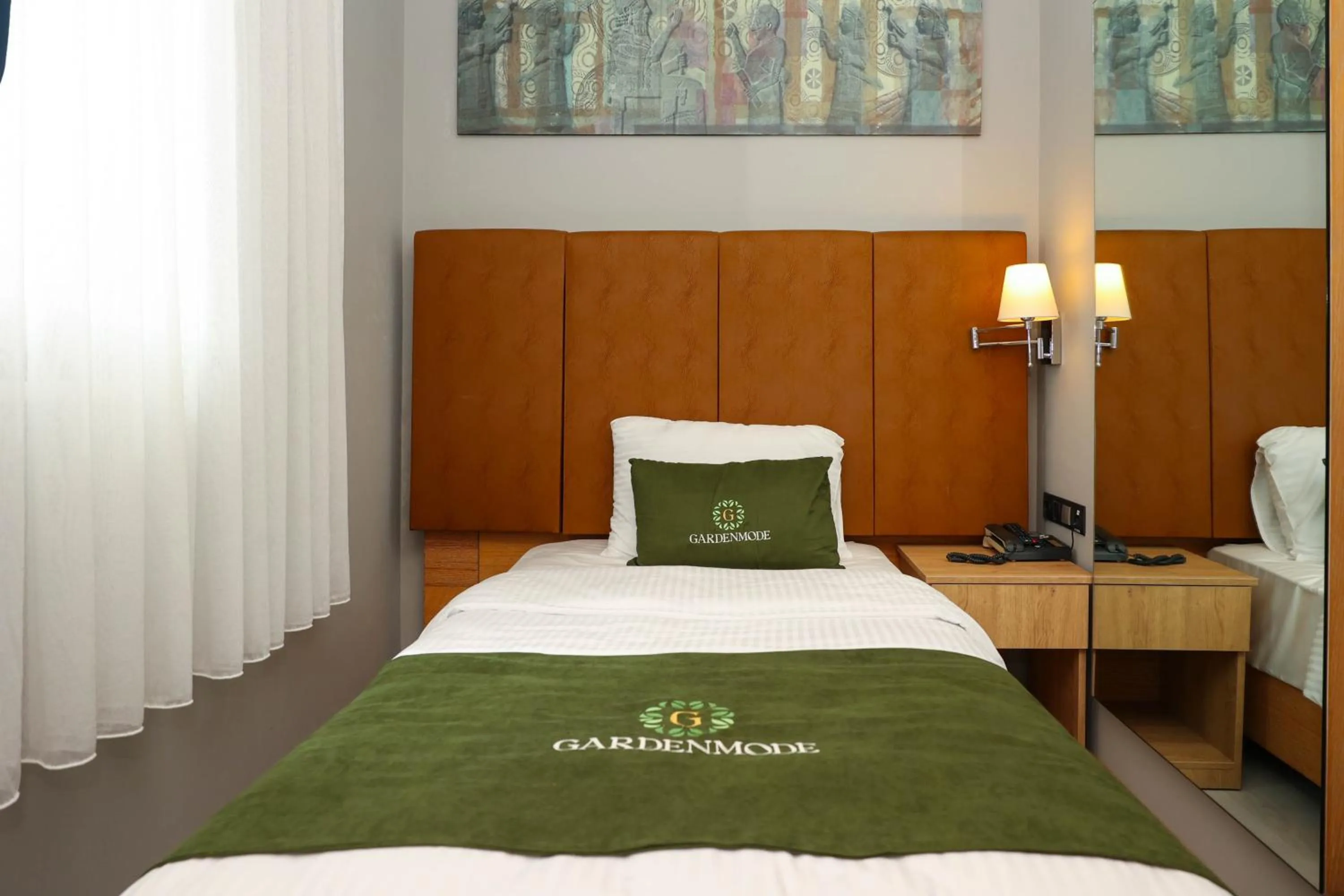 Bed in Gardenmode Airport Hotel