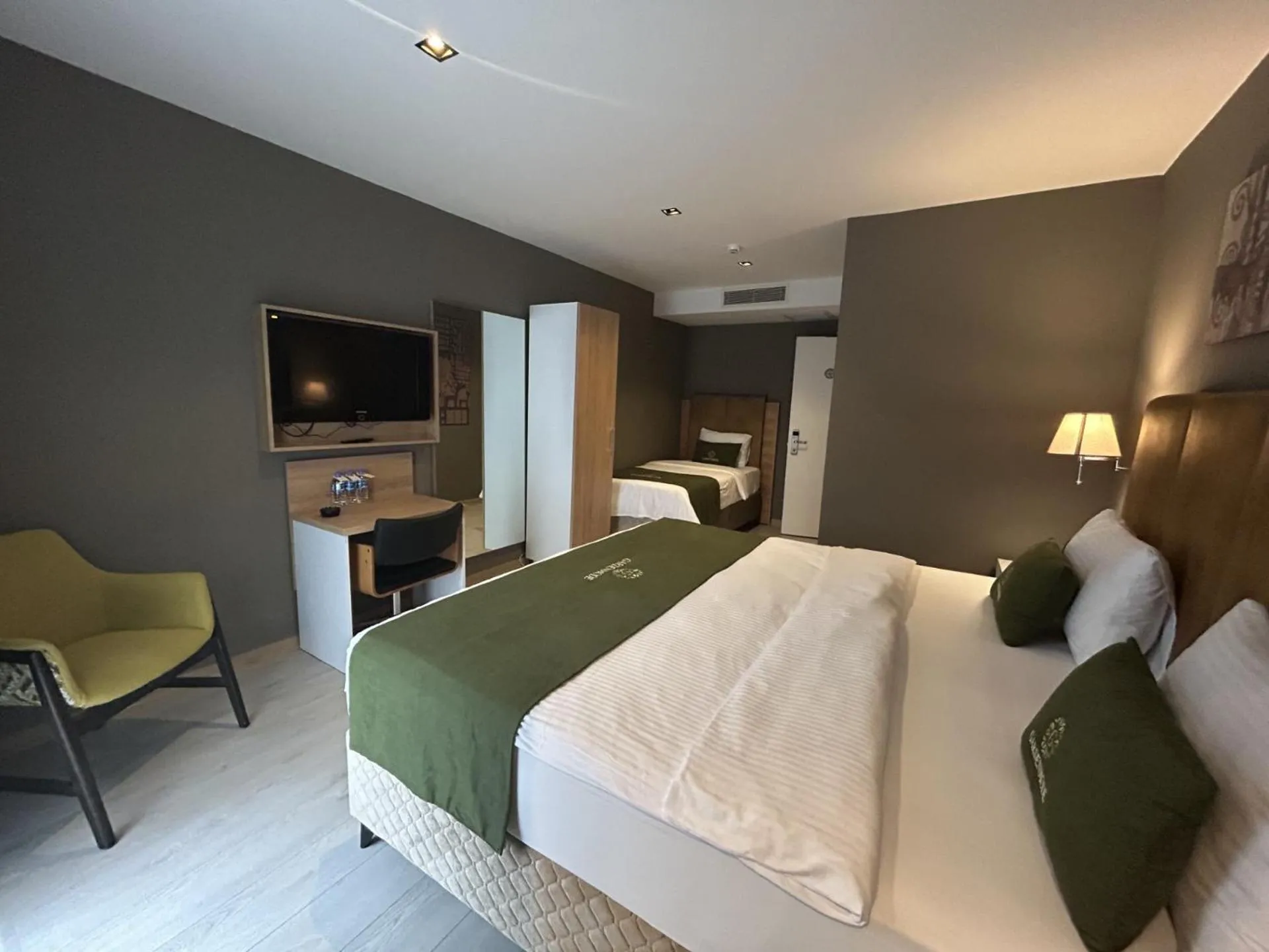 Bed in Gardenmode Airport Hotel