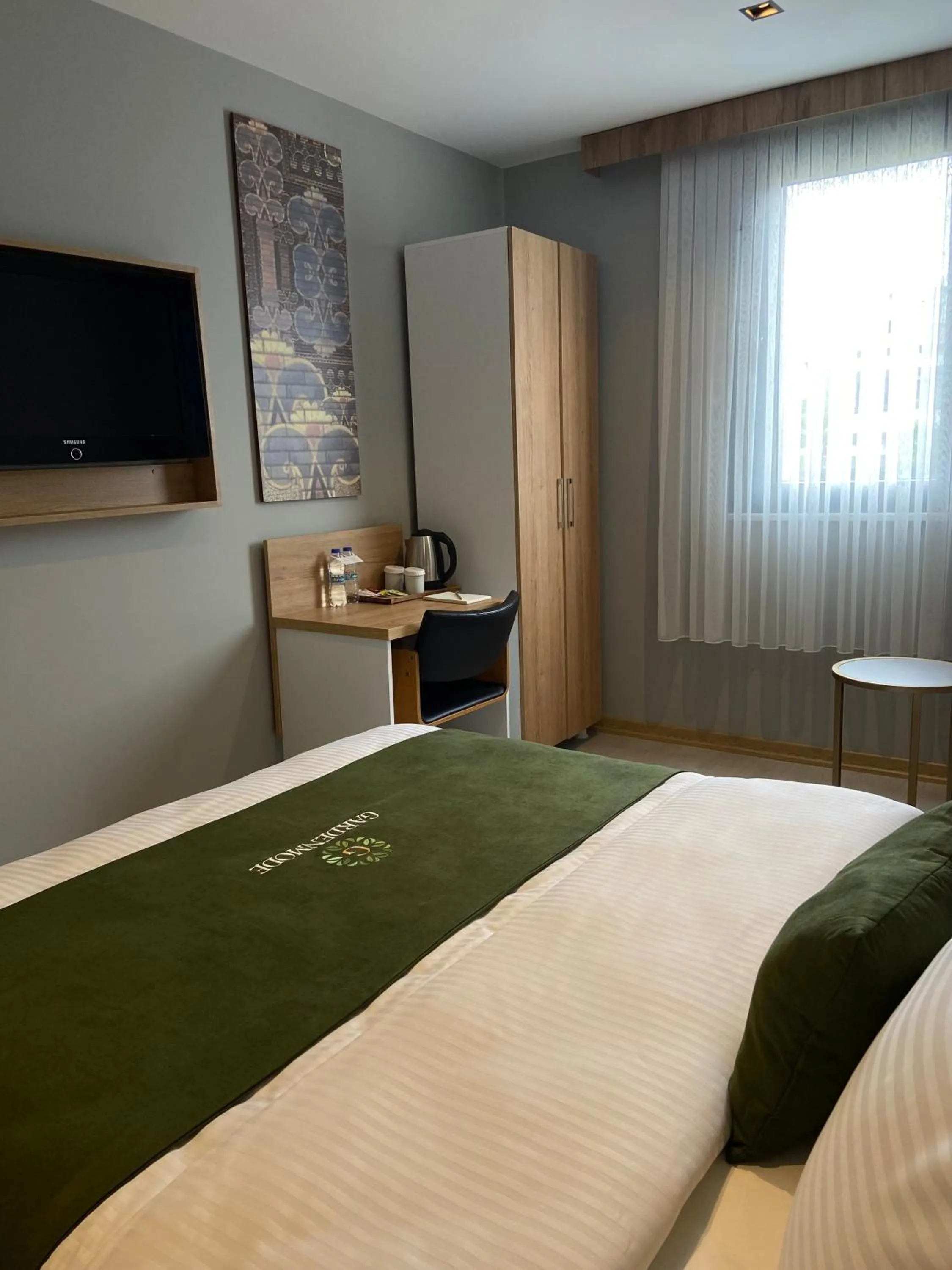 Bed in Gardenmode Airport Hotel