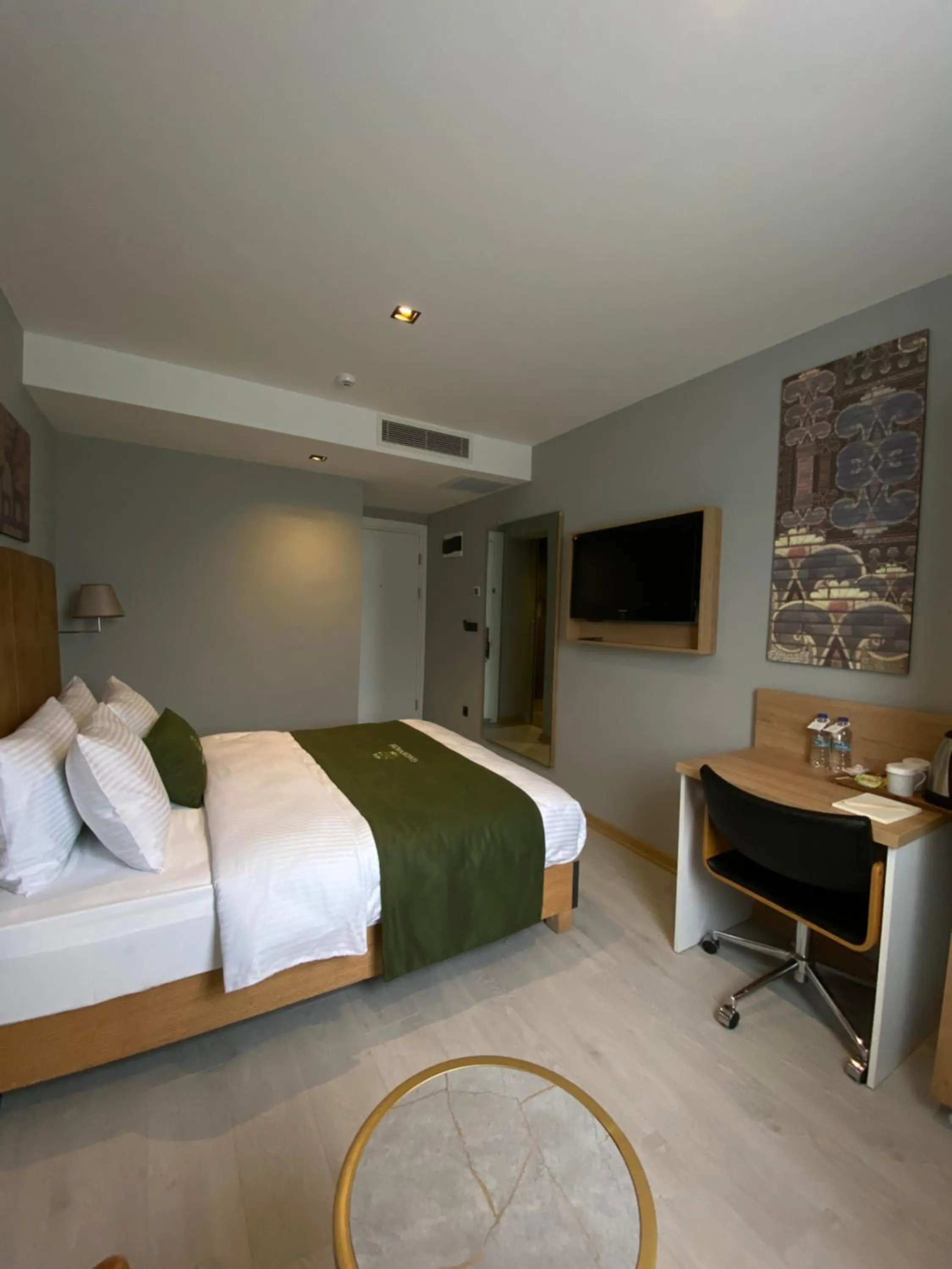 Bed in Gardenmode Airport Hotel