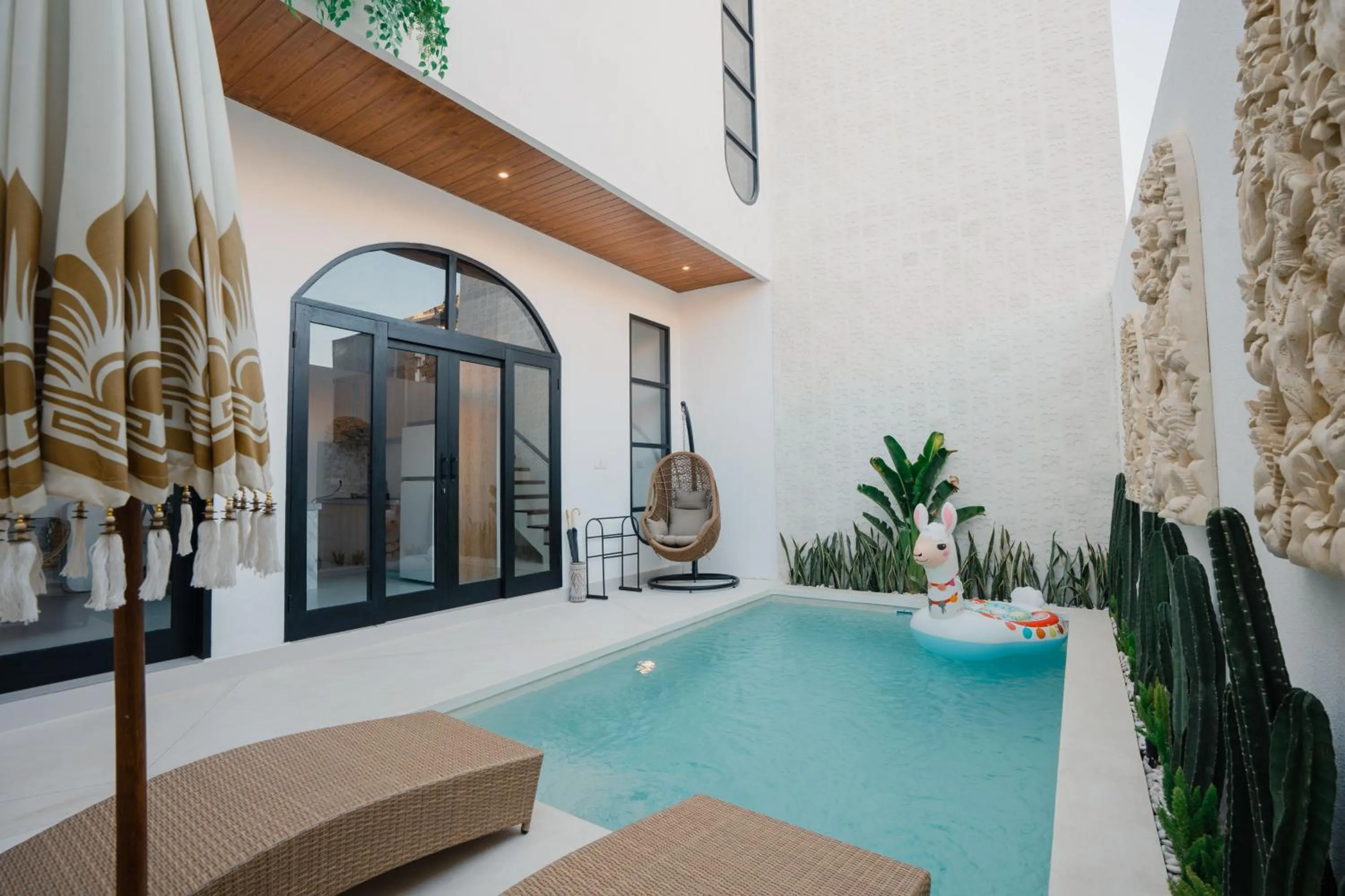 Swimming pool in Melviano Suite & Villa