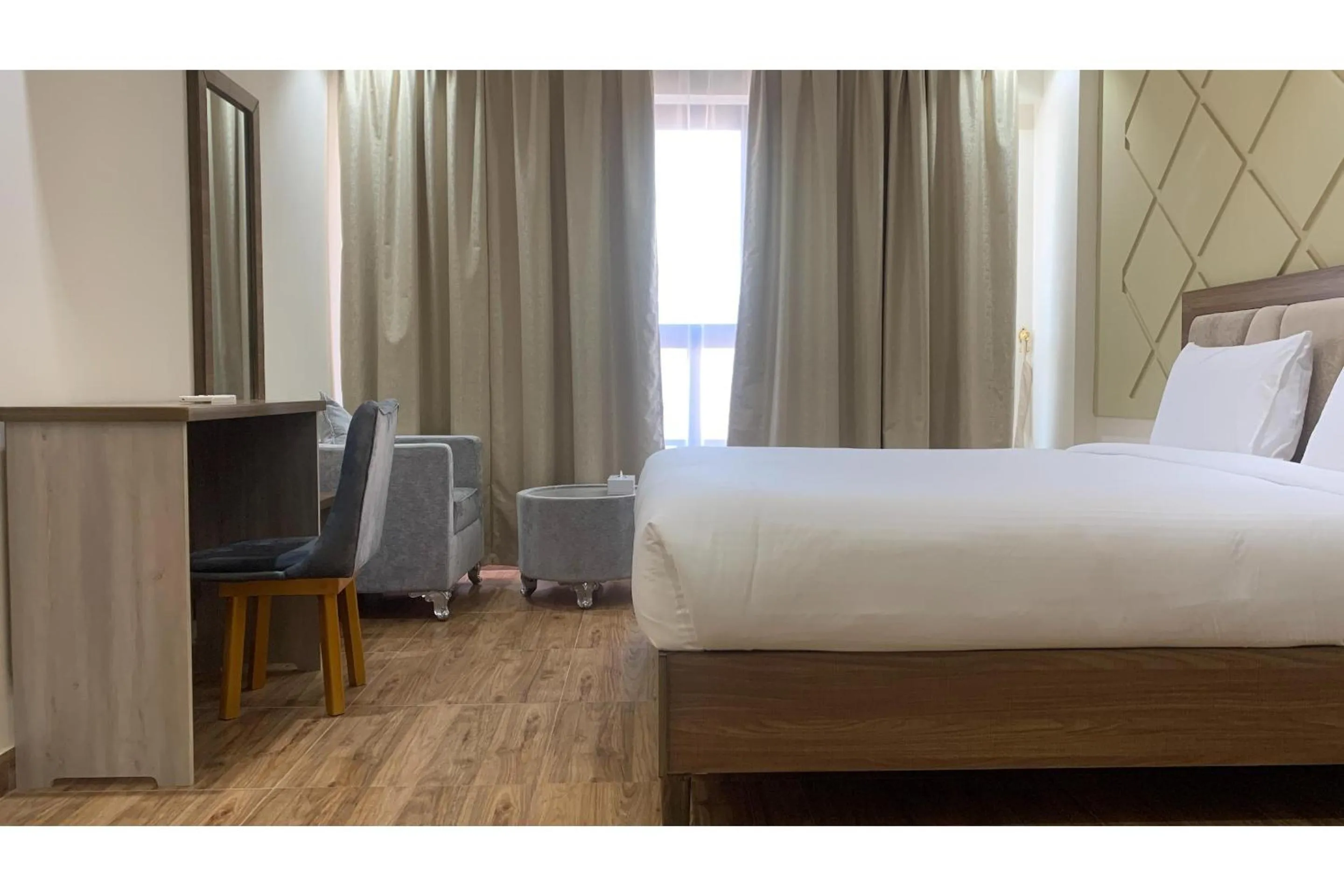 Bedroom, Bed in OYO Townhouse 156 Rose Hotel Apartments