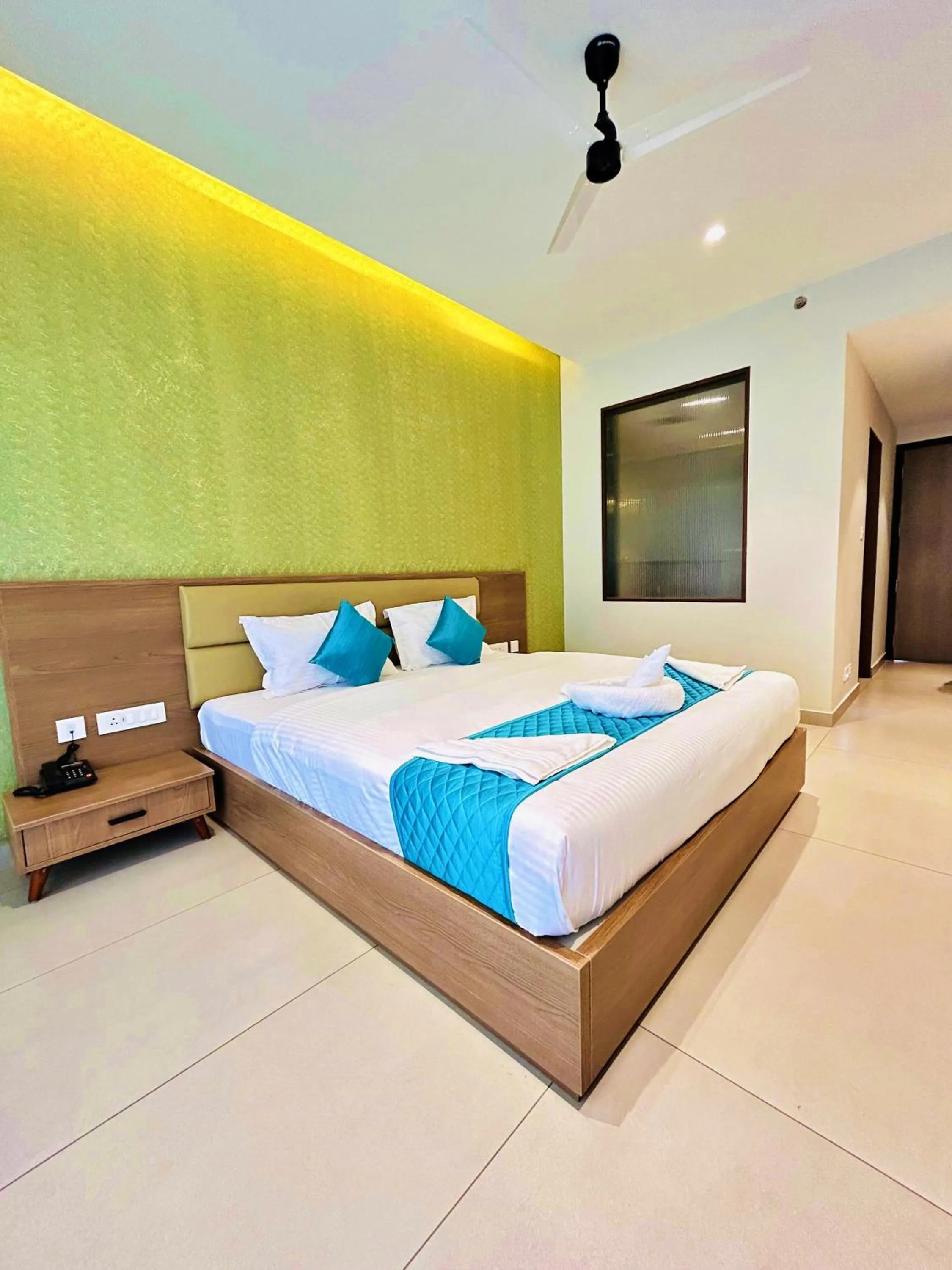 Bed in VAGA NAKSHATHRA SUITES