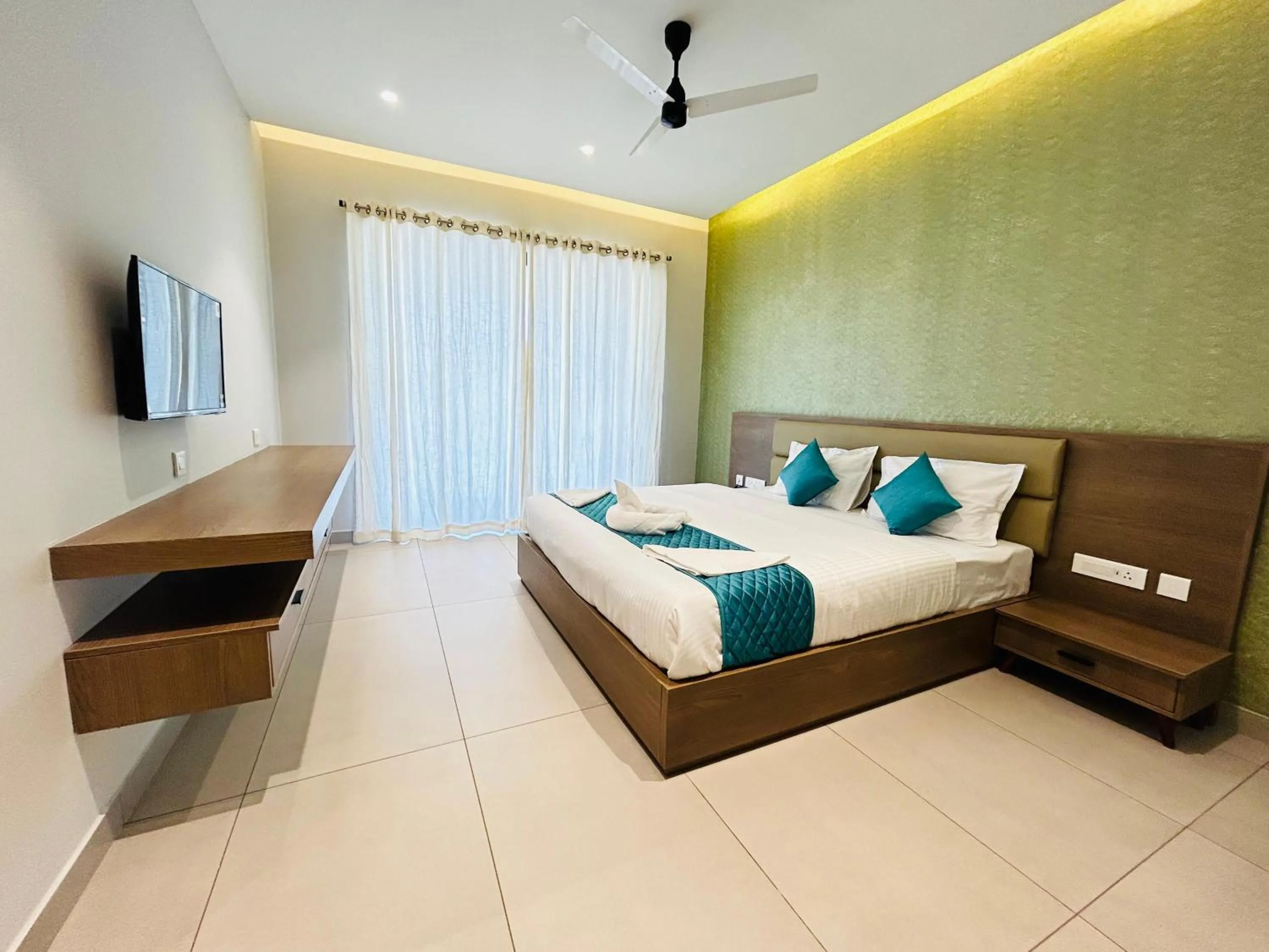 Bed in VAGA NAKSHATHRA SUITES