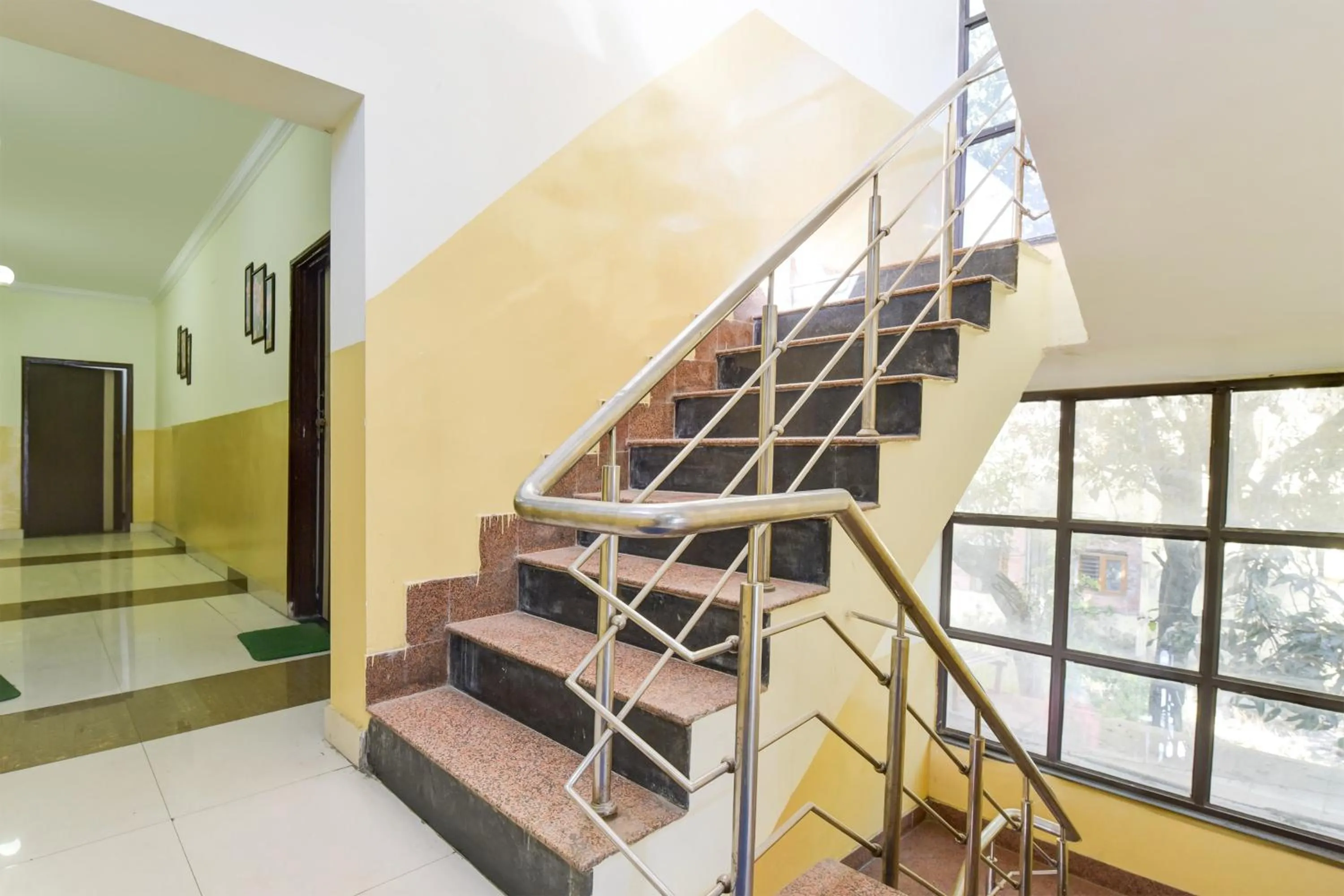 Lobby or reception in Hotel O Homewood Suites And Guest House