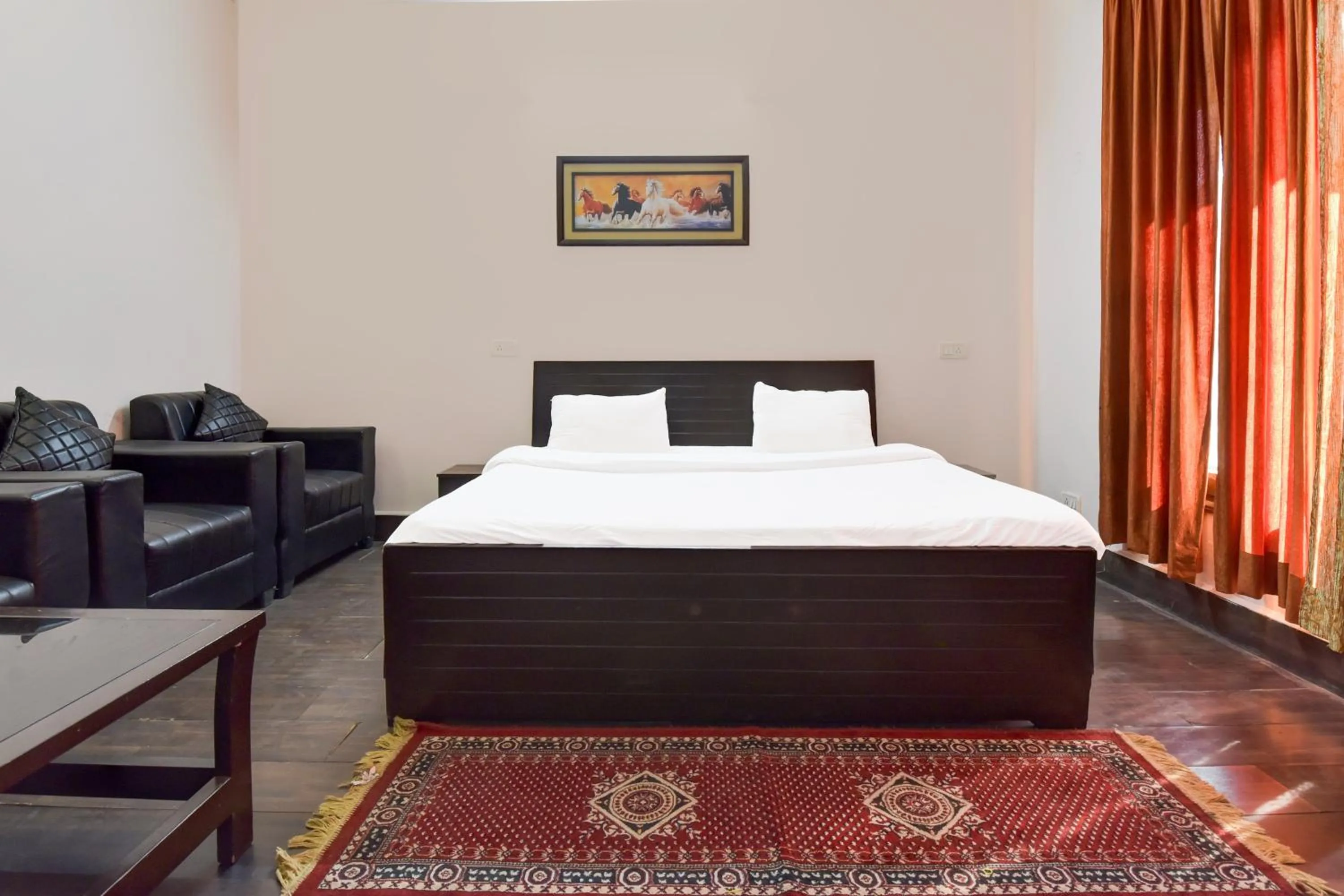 Bedroom, Bed in Hotel O Homewood Suites And Guest House