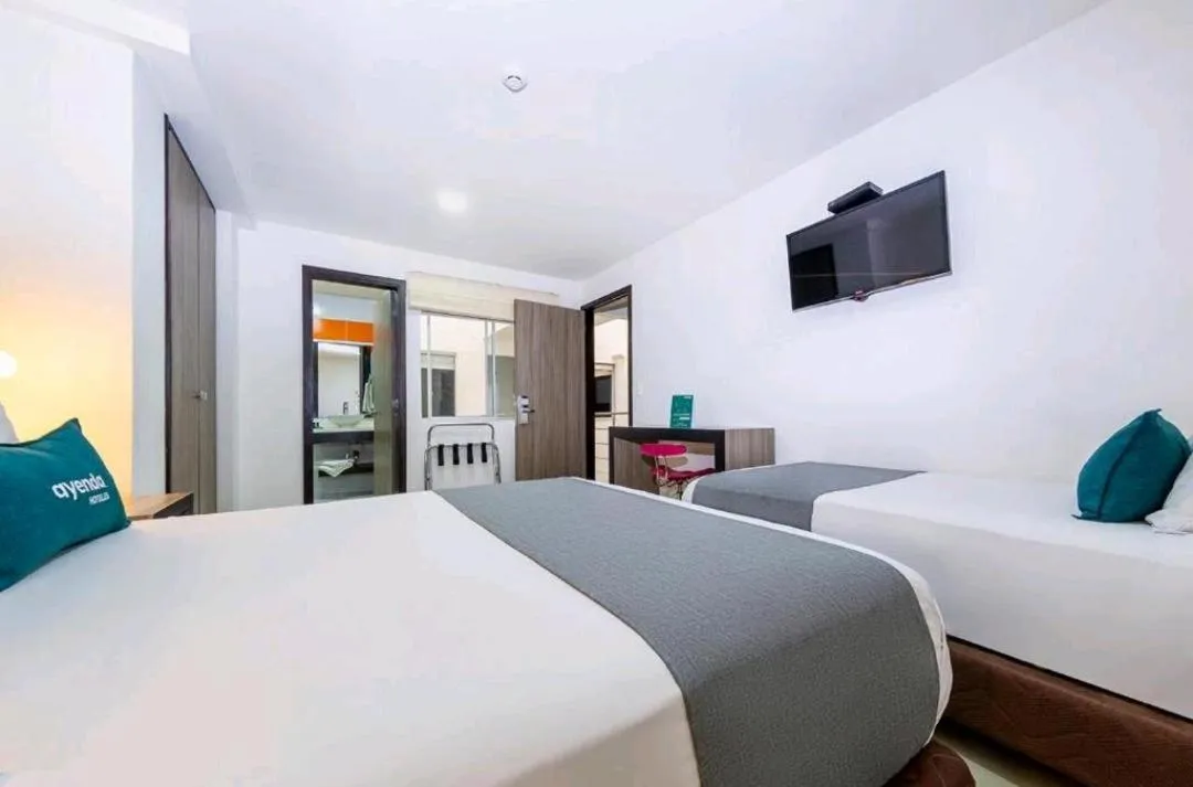 Bedroom, Bed in Hotel MH Pereira