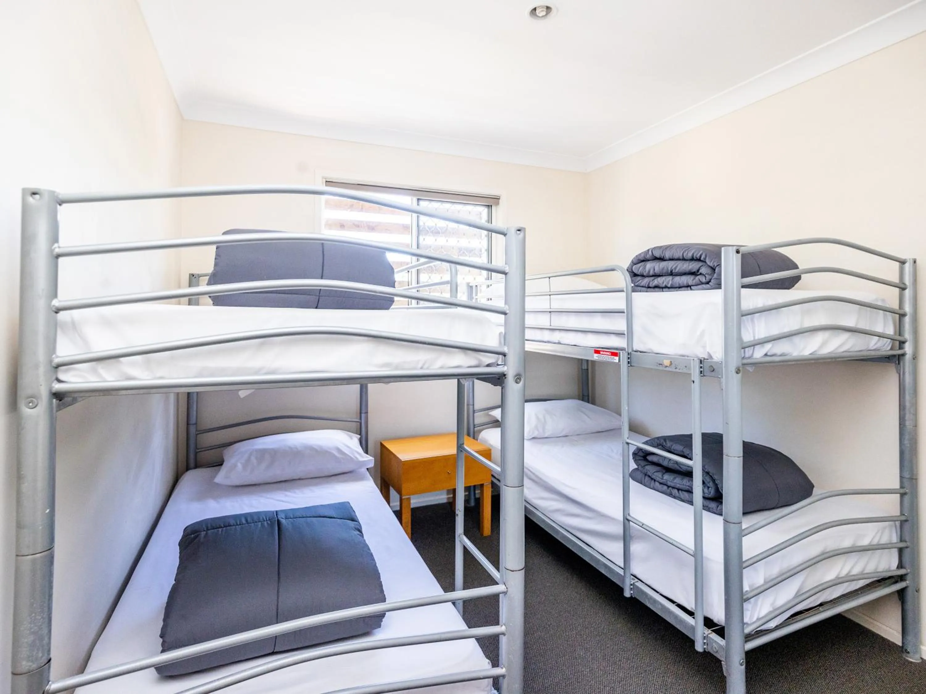 Photo of the whole room, Bed in NRMA Treasure Island Holiday Resort
