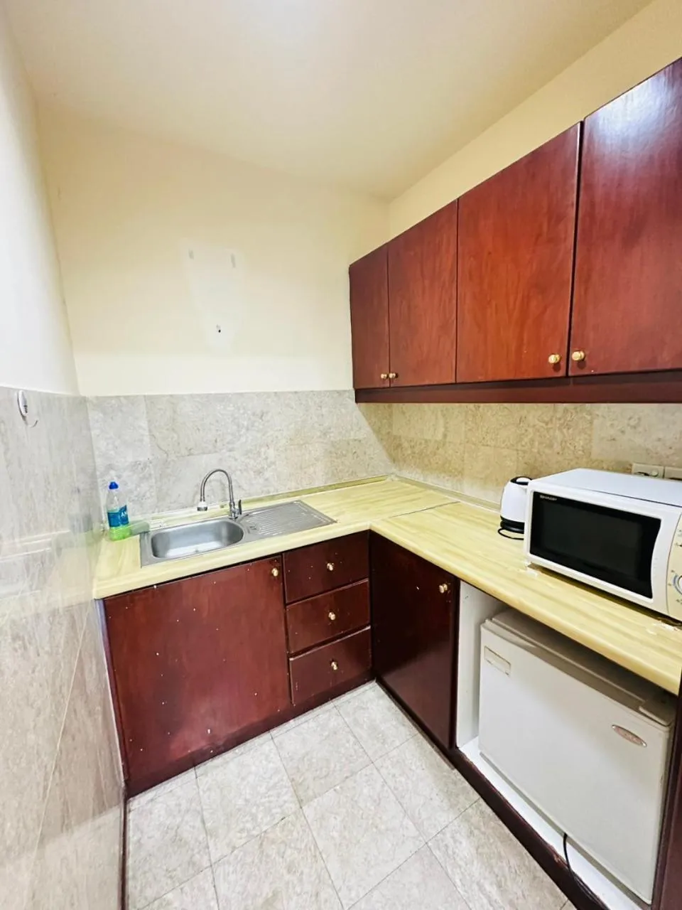 Kitchen or kitchenette in KL COZY GOLD SUITE At TIMES SQUARE