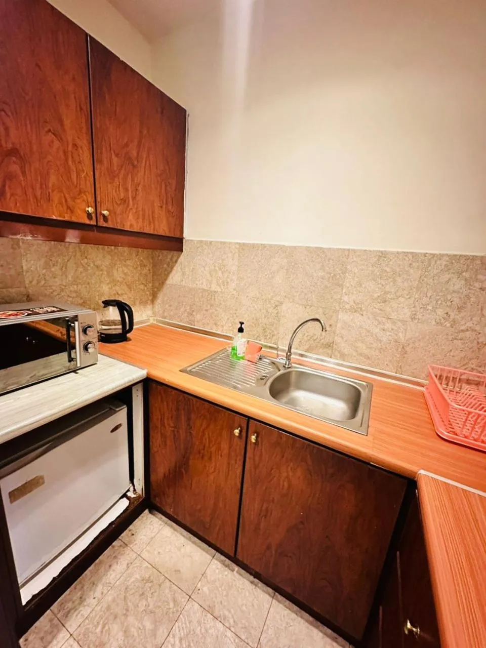 Kitchen or kitchenette in KL COZY GOLD SUITE At TIMES SQUARE