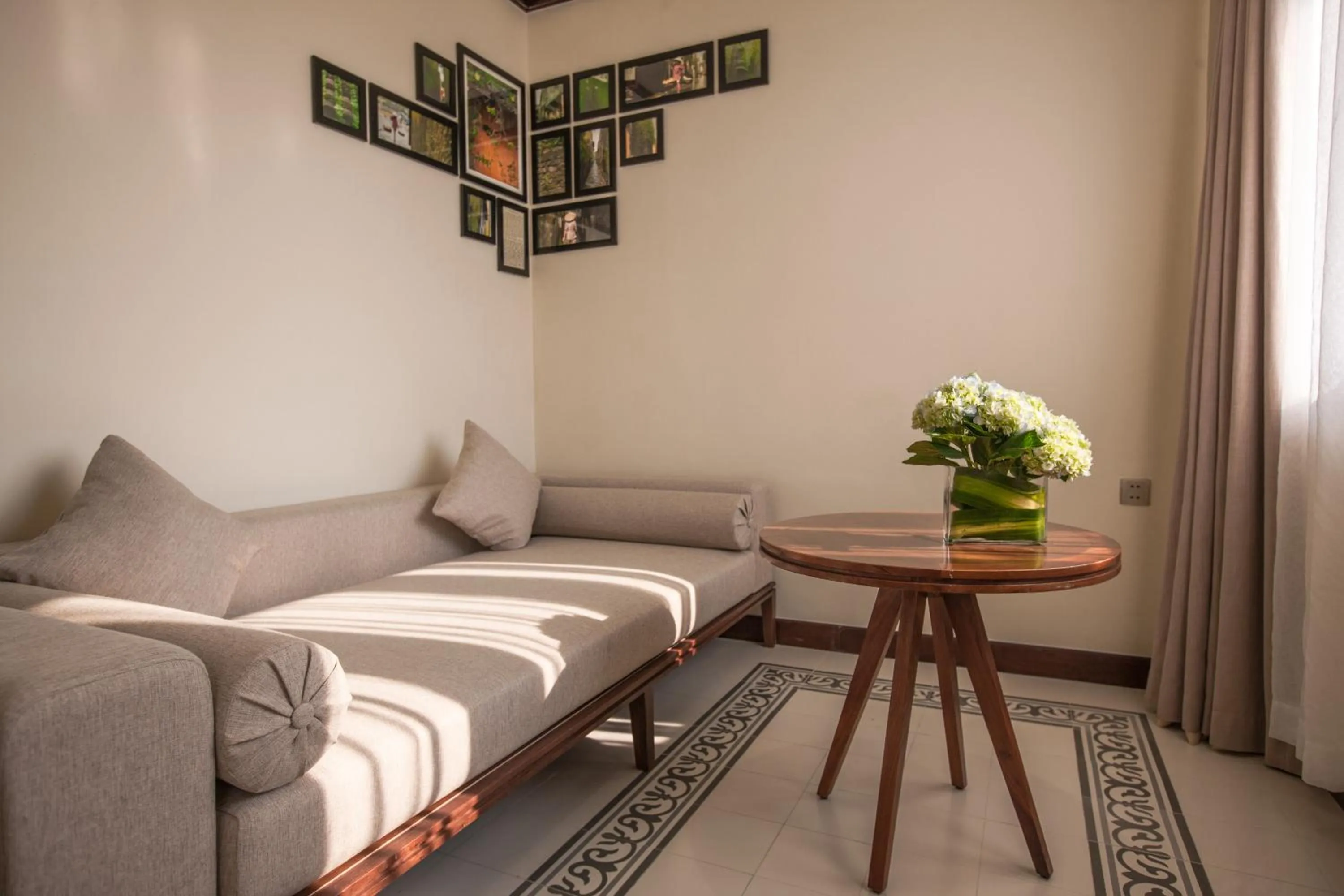 Seating area, Bed in Almanity Hoi An Resort & Spa